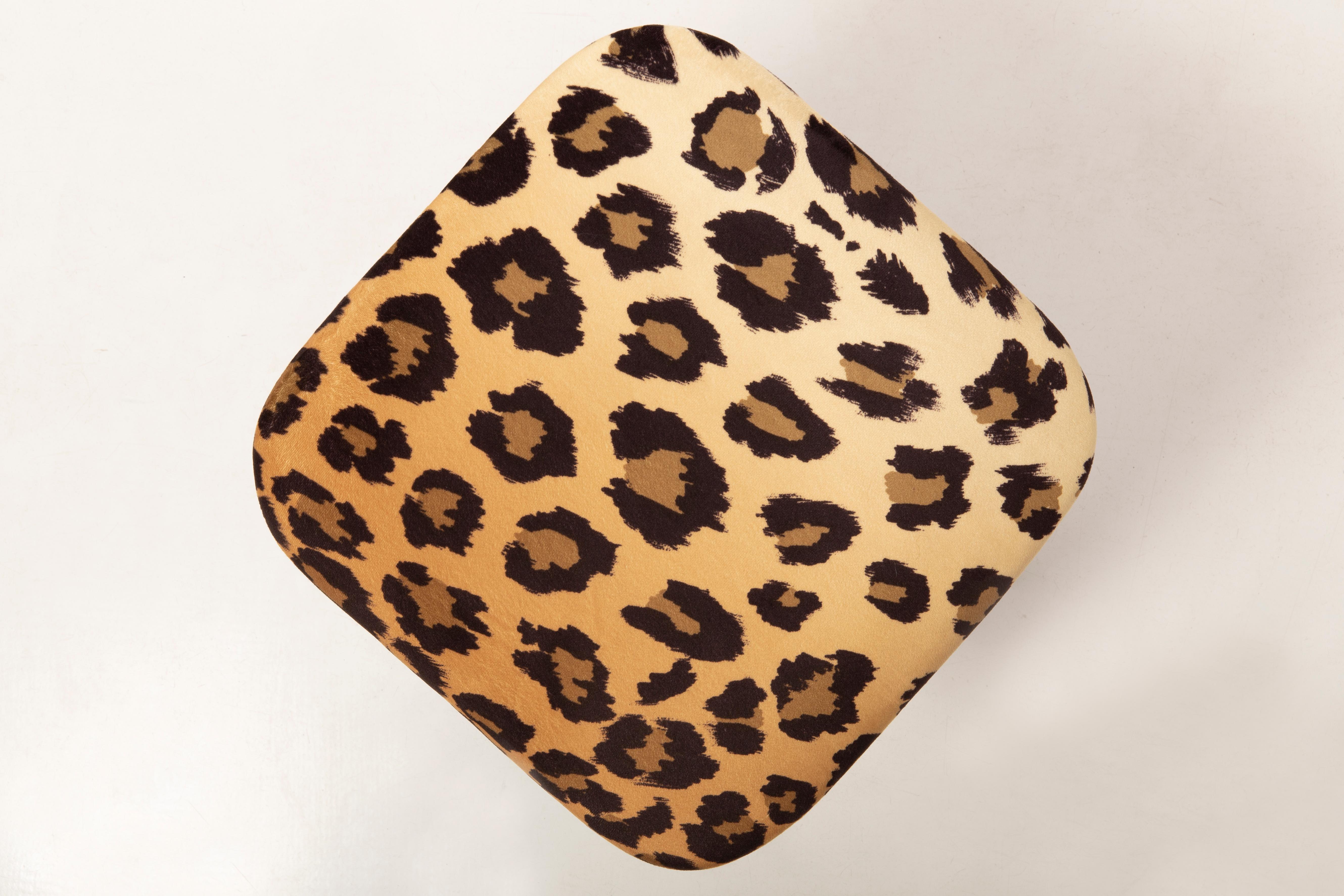 Stool from the turn of the 1960s and 1970s. Beautiful soft velvet leopard print upholstery. The stool consists of an upholstered part, a seat and wooden legs narrowing downwards, characteristic of the 1960s style. We an prepare this stool also in