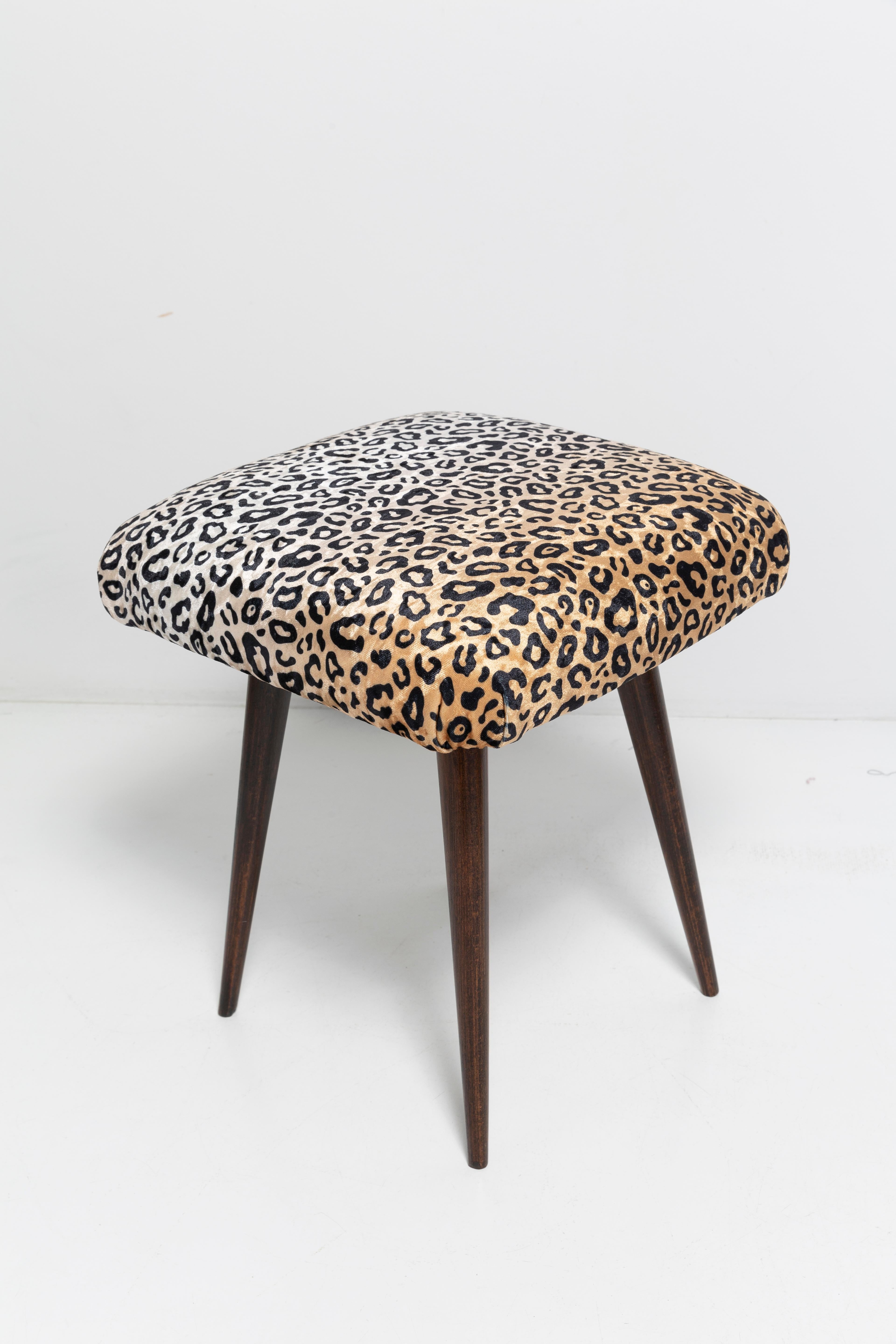 Stool from the turn of the 1960s and 1970s. High-quality printed velvet - soft and very pleasant to the touch, vivid and natural colors - a beautiful, original pattern! The stool consists of an upholstered part, a seat and wooden legs narrowing