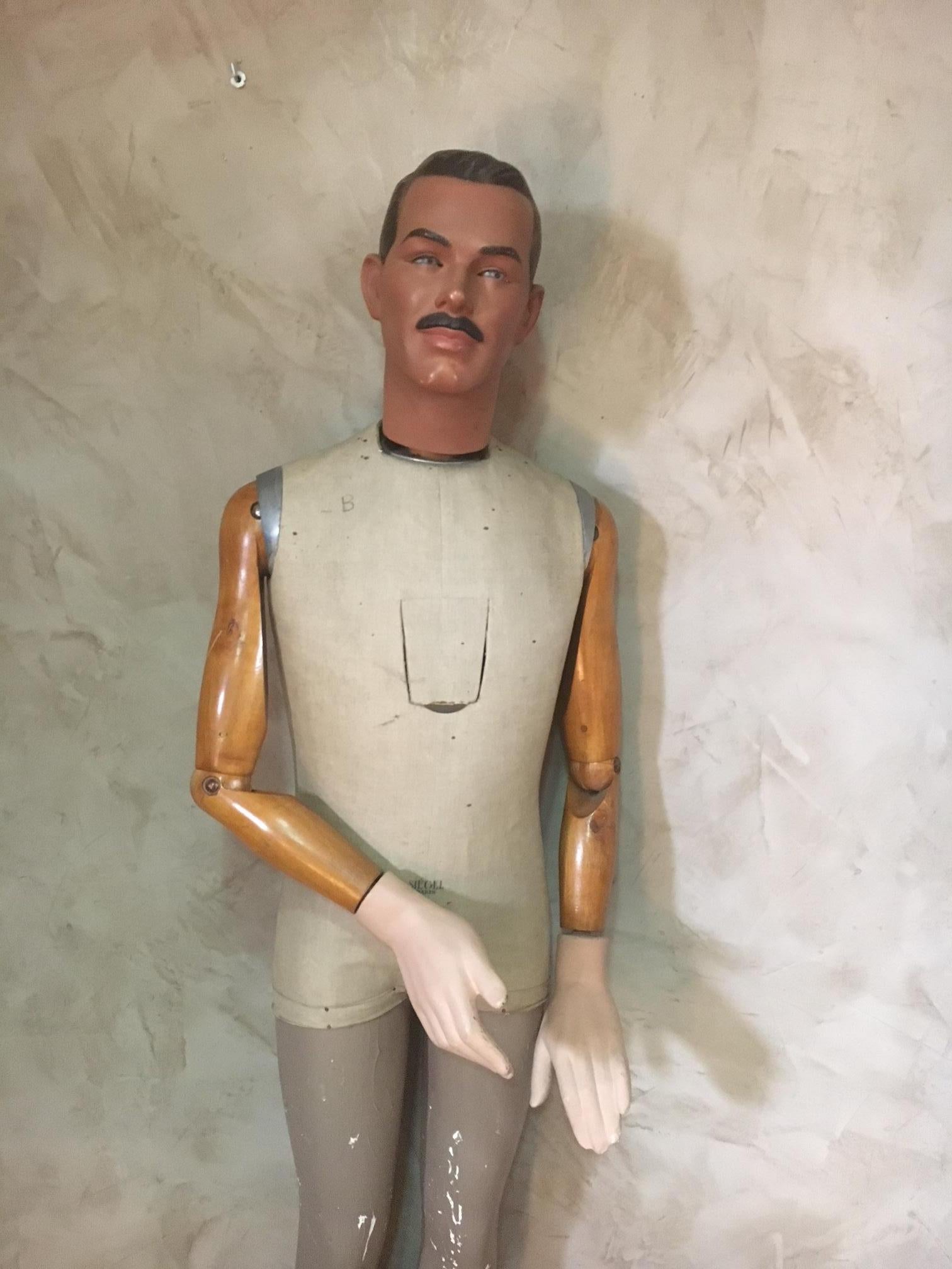Very rare and beautiful lifesize French Siegel plaster mannequin from the 1930s.
His has blue glass eyes. The arms are articulated. The hands and the head are removable.
His painted head can turn and look different directions.
There is a metal