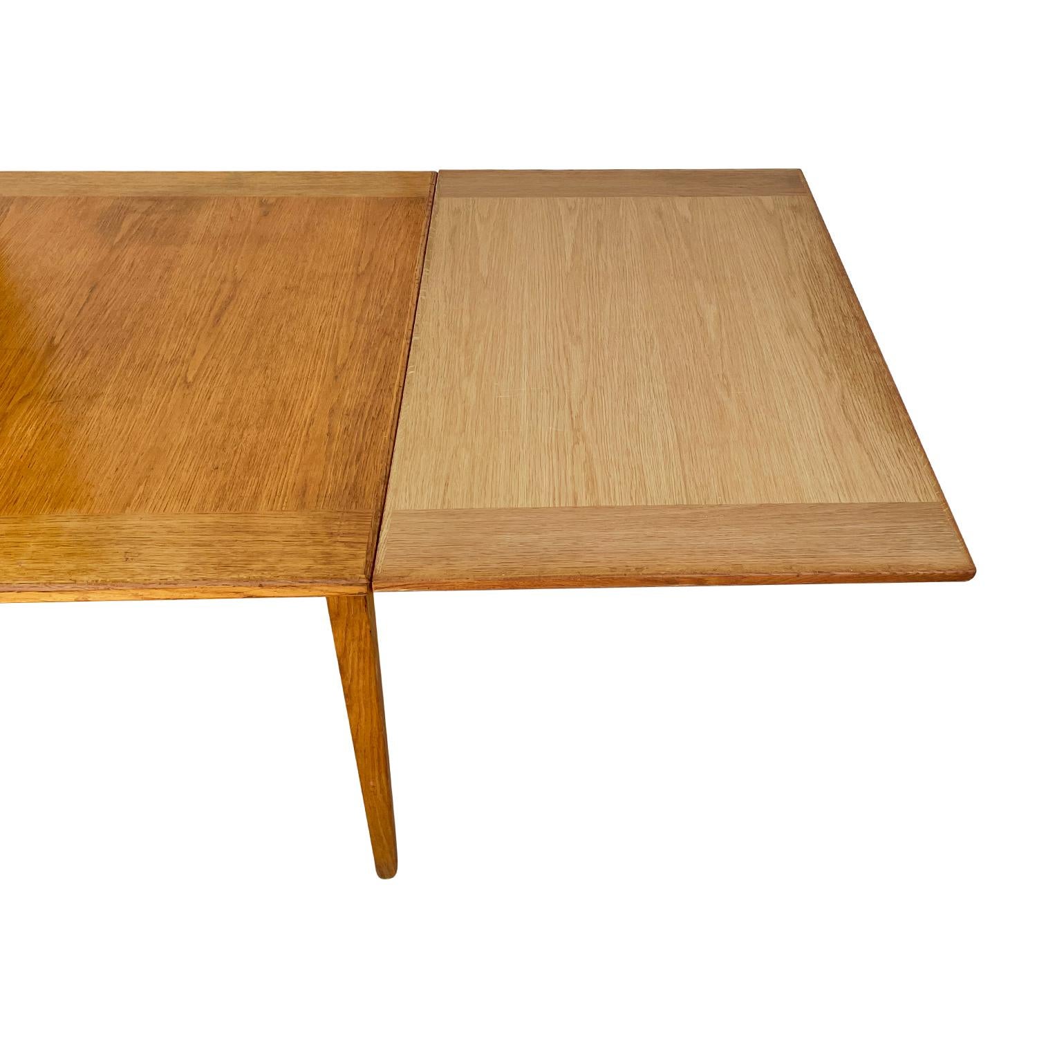 Hand-Carved 20th Century Swedish Mid-Century Extendable Walnut Dining Table by Carl Malmsten For Sale