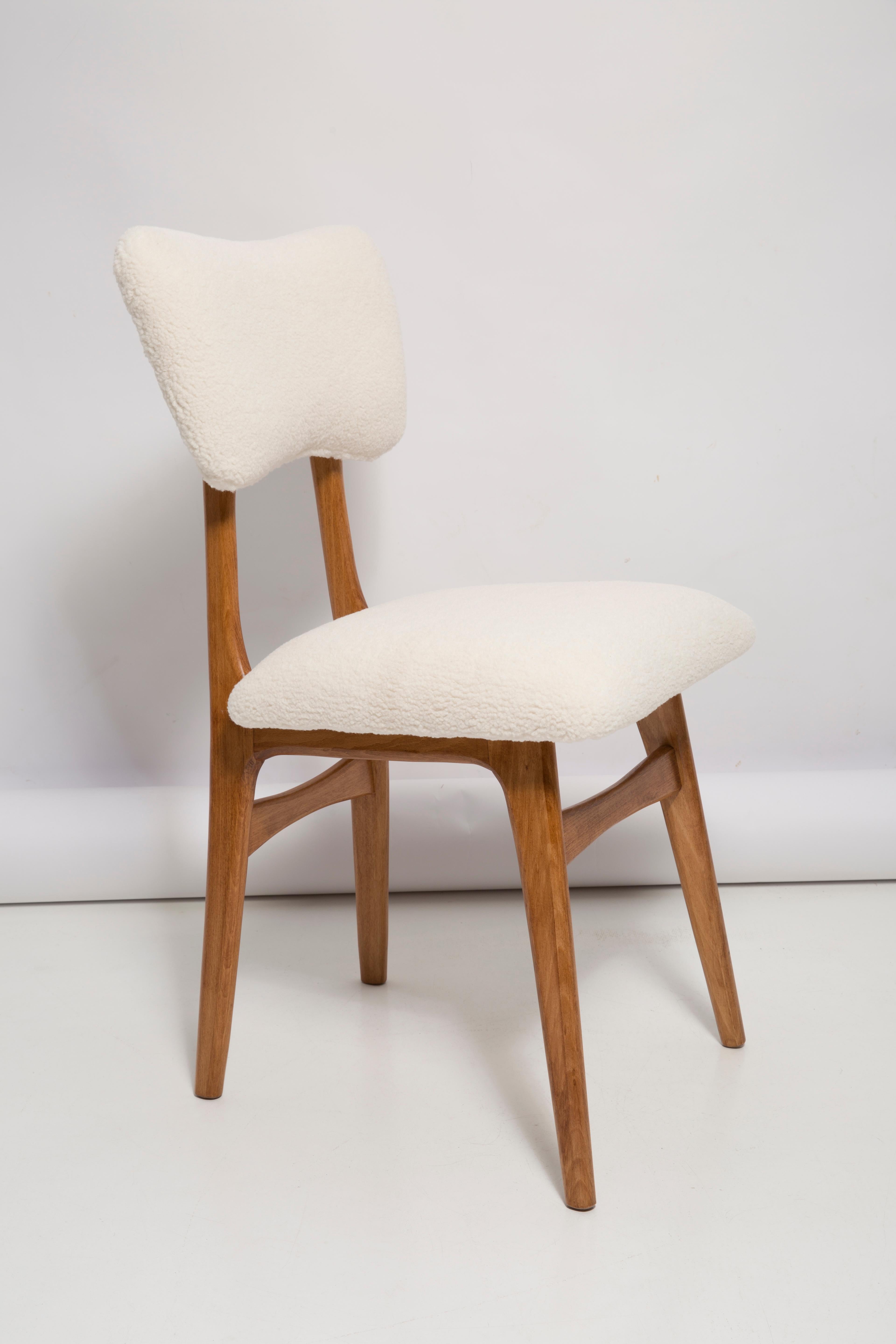 Chair designed by Prof. Rajmund Halas. Made of beechwood in medium oak color. Chair is after a complete upholstery renovation; the woodwork has been refreshed. Seat and back is dressed in crème, durable and pleasant to the touch bouclé fabric (color