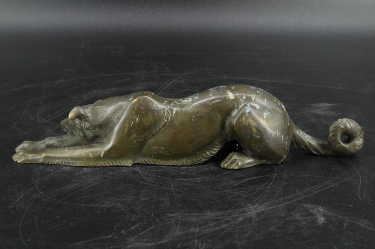 Louis Albert Carvin bronze sculpture of Greyhound laying down.
Impressed 