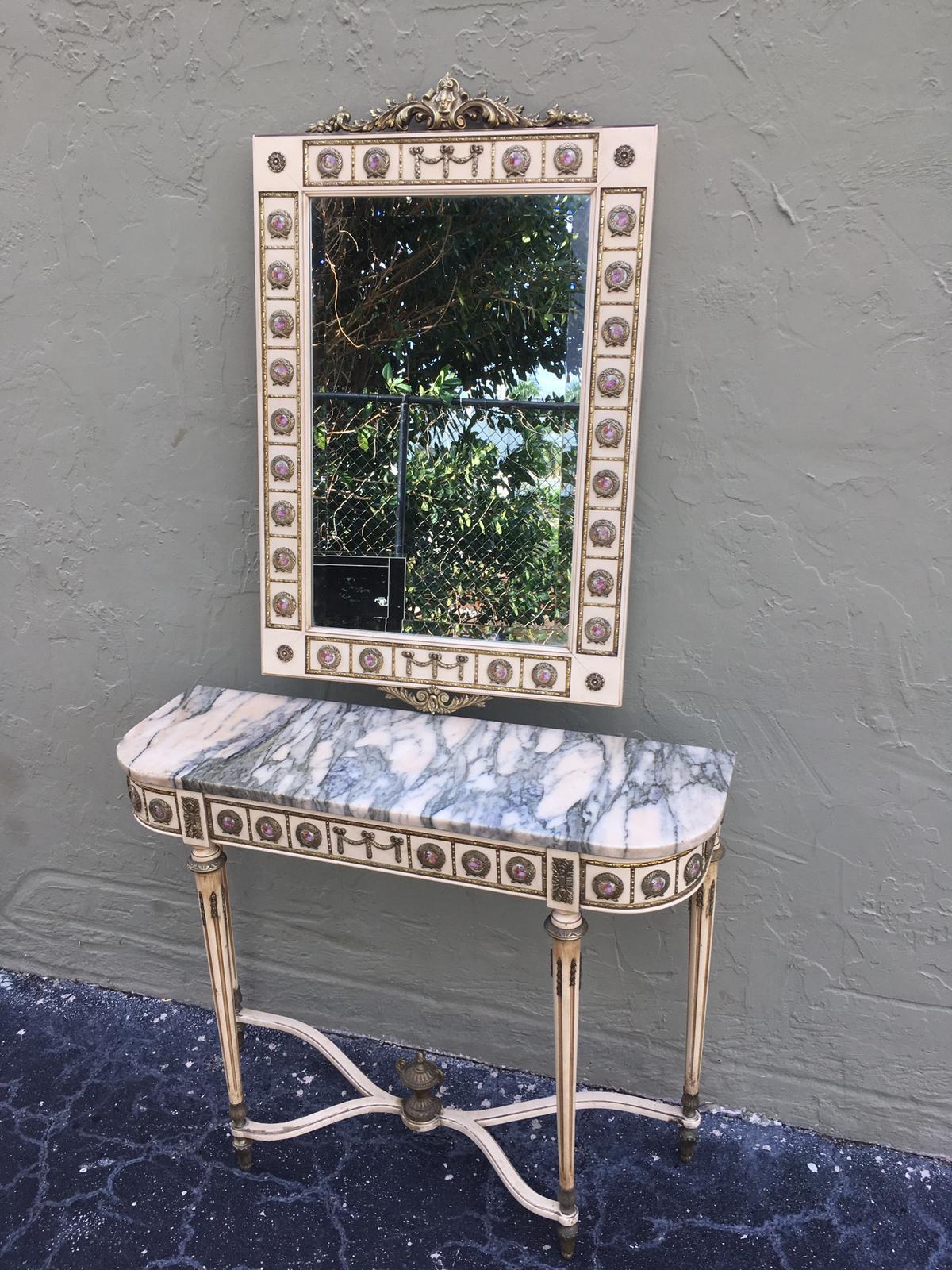20th century Louis Philippe style wood and ceramic console table and matching mirror.

