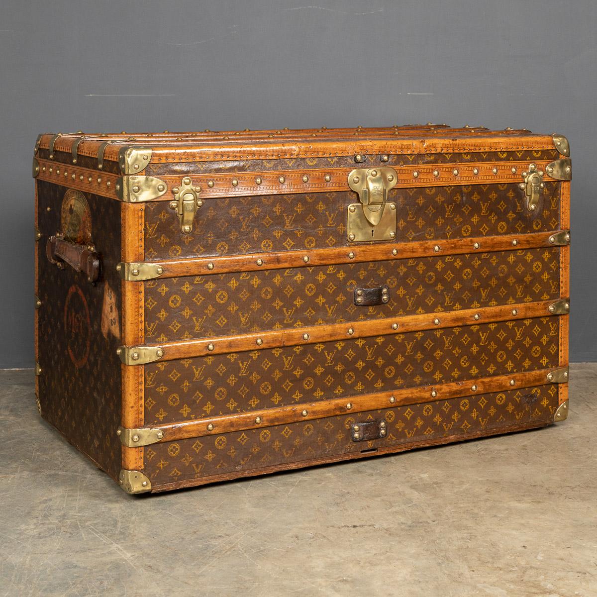 Antique early 20th century Louis Vuitton trunk covered in the world famous LV monogrammed canvas, with its lozine borders and brass fitting this trunk would have been the top of the line even at the time of purchase over 100 years ago. This
