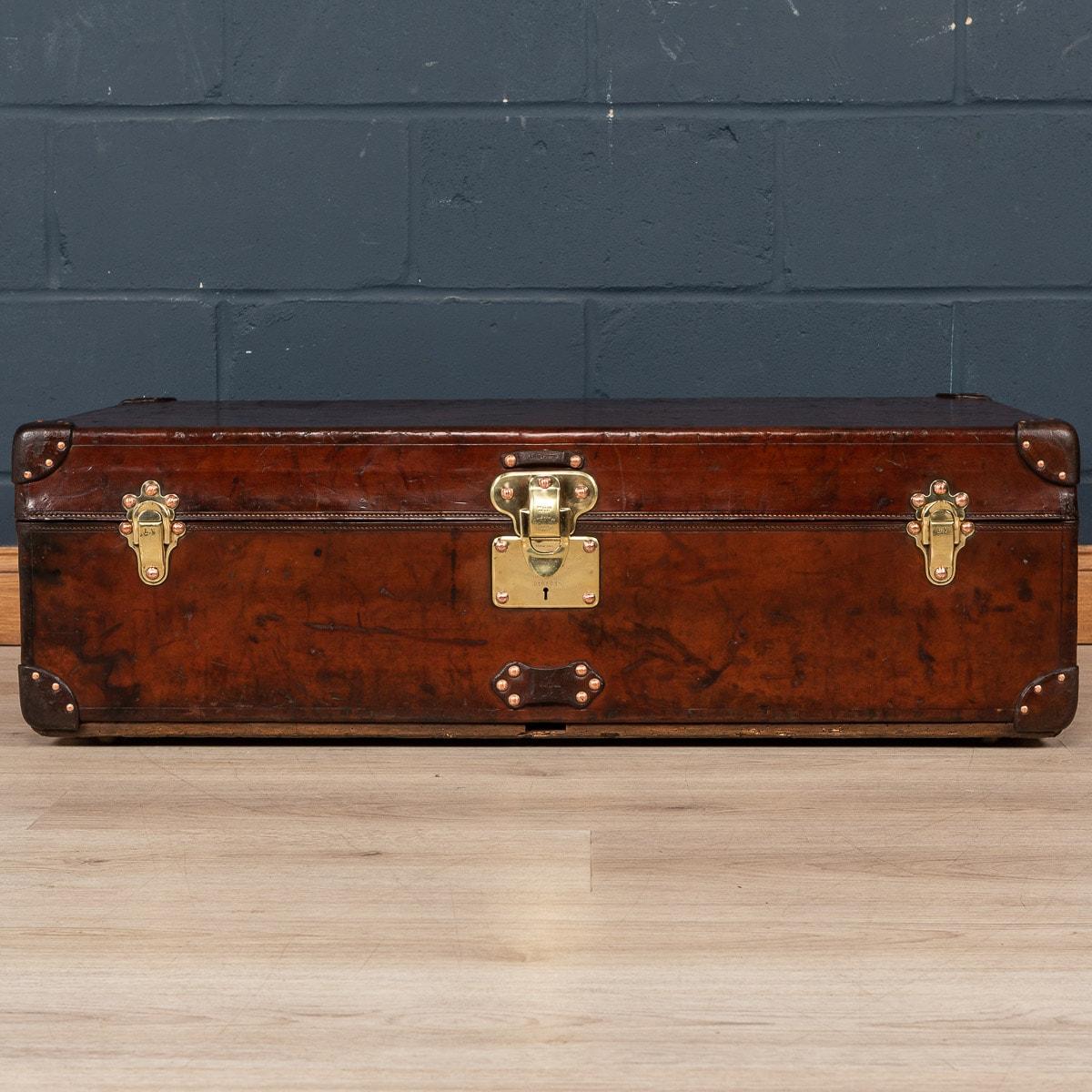 A rare Louis Vuitton cabin trunk covered in leather. Dating to the early part of the 20th century, covered not in the world famous (but more common) monogram canvas but in a single piece of cow hide. These all-leather trunks were made by special