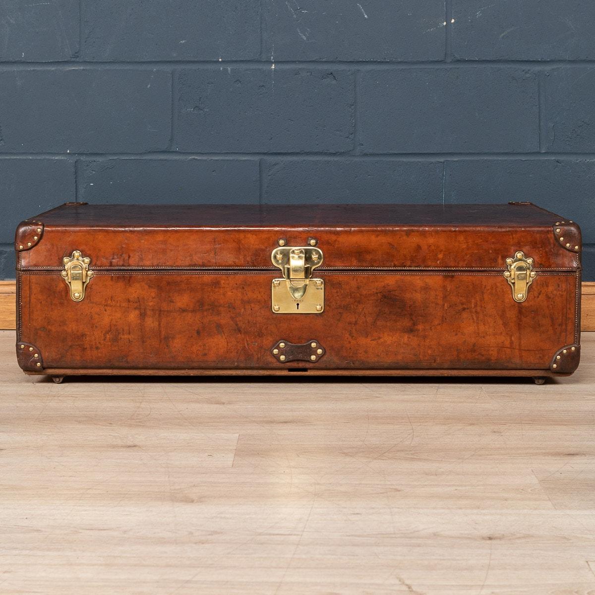 A rare Louis Vuitton cabin trunk covered in leather. Dating to the early part of the 20th century, covered not in the world famous (but more common) monogram canvas but in a single piece of cow hide. These all-leather trunks were made by special