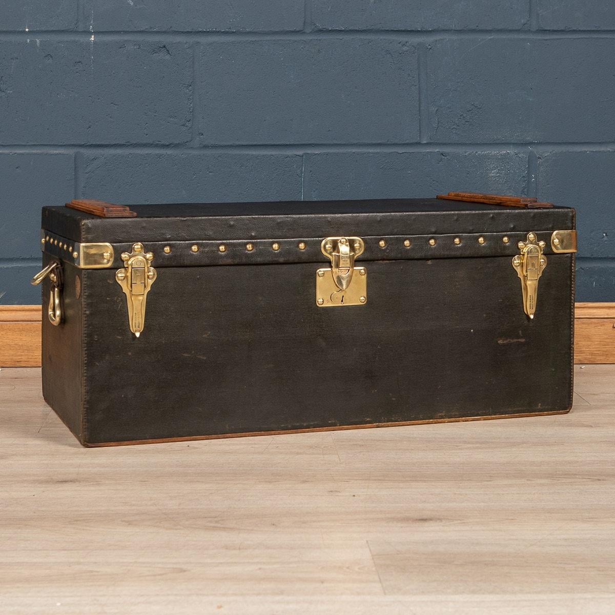 A large and very rare Louis Vuitton car trunk covered in green Vuittonite canvas. Vuittonite is a stain and water resistant canvas that was used on Vuitton’s trunks from the turn of the century to 1920‘s. Car trunks were usually bespoke, made for