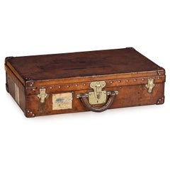 20th Century Louis Vuitton Cow Hide Suitcase, France c.1920
