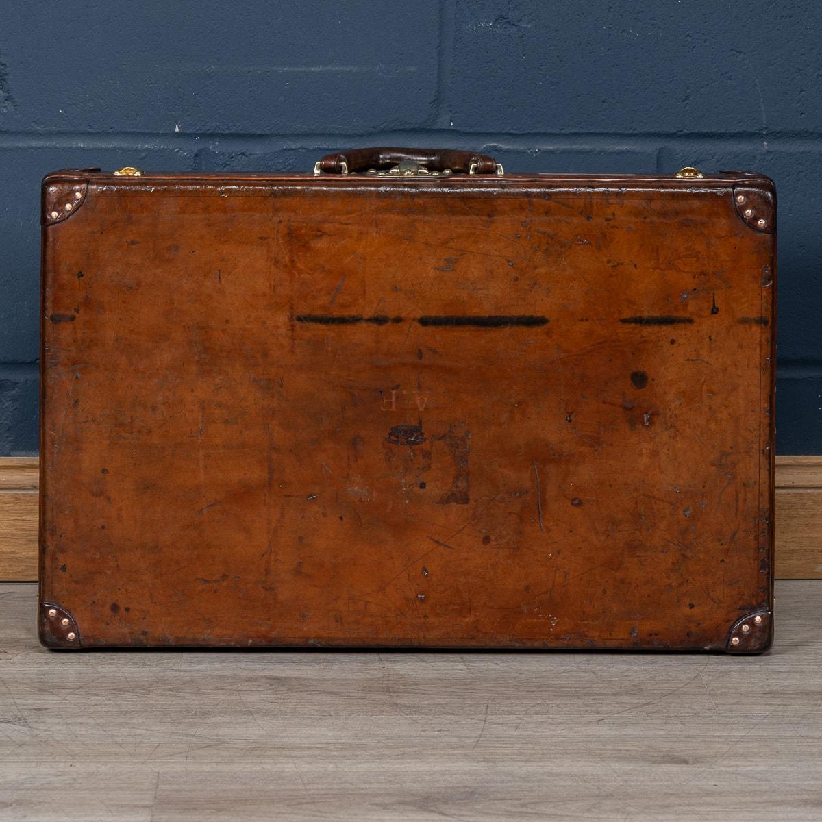20th Century Louis Vuitton Cow Hide Suitcase, France c.1920 In Fair Condition For Sale In Royal Tunbridge Wells, Kent