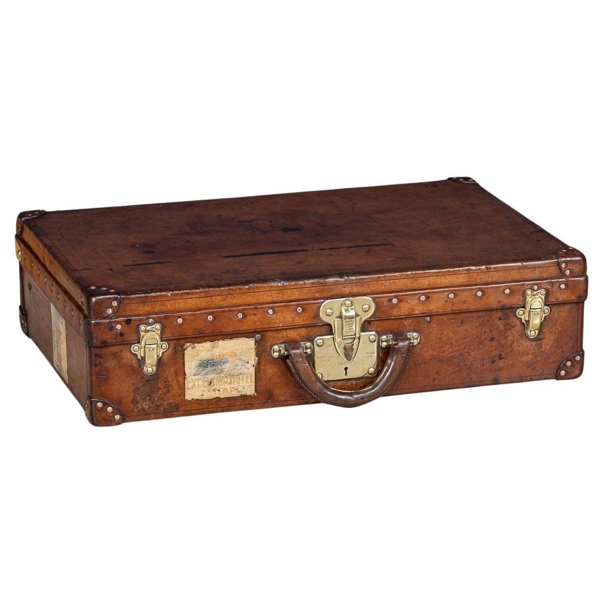 20th Century Louis Vuitton Cow Hide Suitcase, France c.1920 For Sale