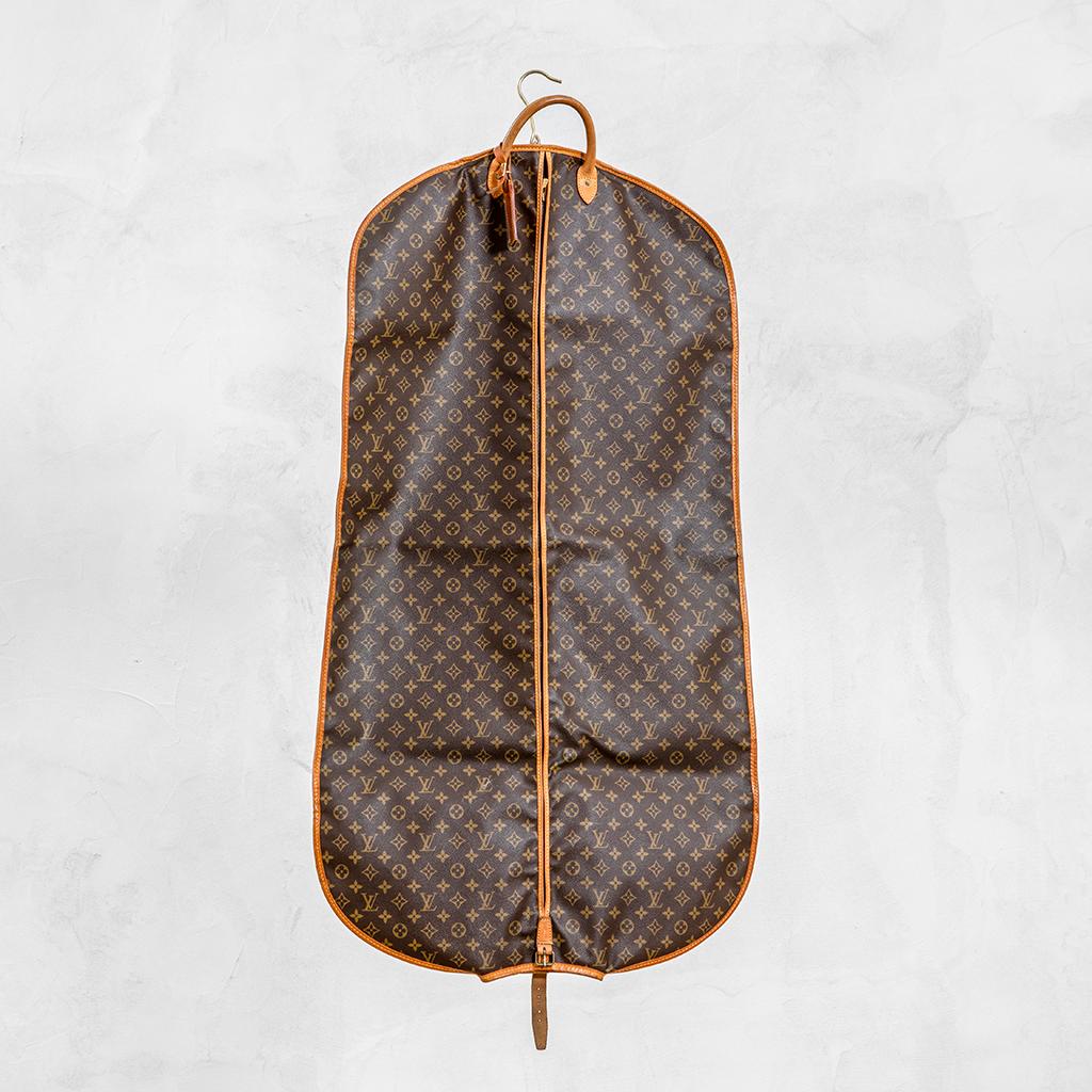 The Garment Cover by Louis Vuitton from the 80s is fashioned from Monogram canvas with a well-designed construction to insure a comfortable carry, even with weighty items such as suits or evening dresses. It is entirely in leather and gold-color
