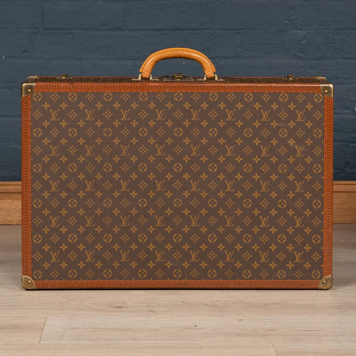 A charming Louis Vuitton hard-sided case, second half of the 20th century, the exterior finished in the famous monogram canvas with brass fittings. A great piece for use today or as an item for the home.

Please note that our interior pieces are