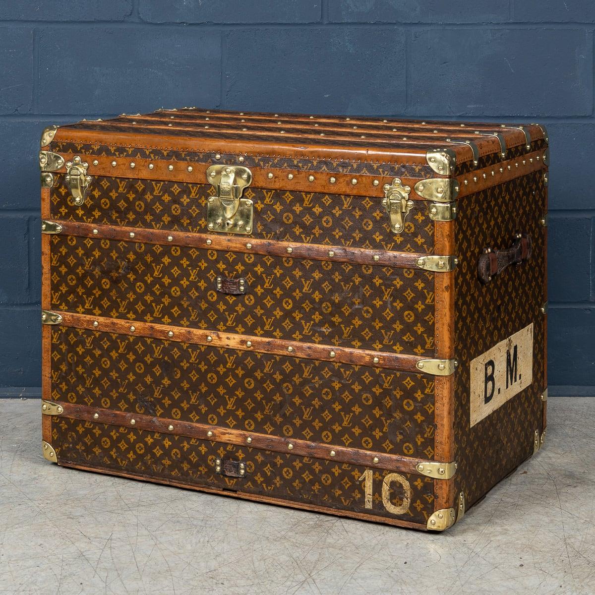 An exquisite early 20th Century “malle haute“ (tall trunk) by Louis Vuitton. Covered in the world famous LV monogrammed canvas, with its leather trim and brass fittings, it would have been the top of the line even at the time of purchase some 100+
