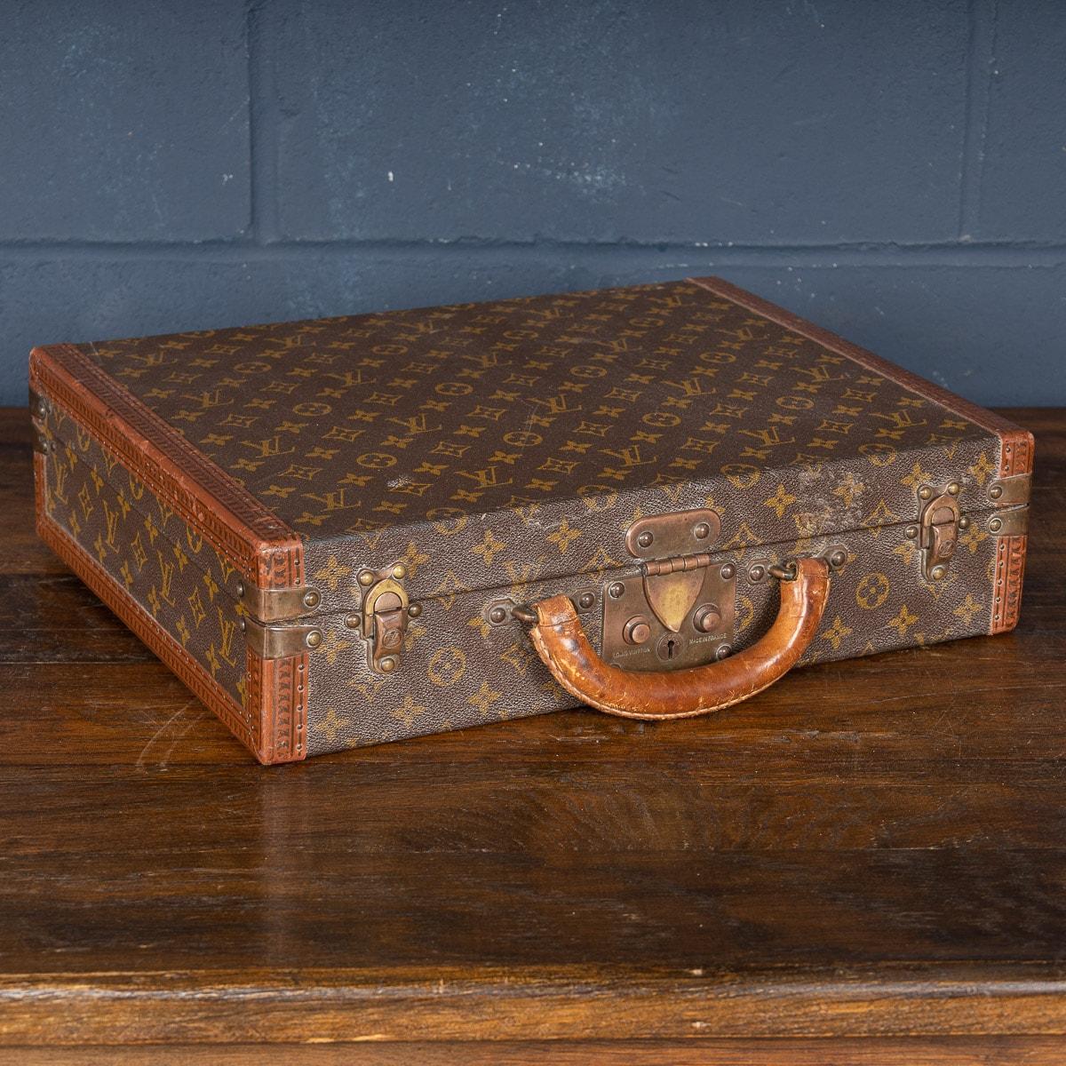 A charming Louis Vuitton hard-sided case, late 20th century, the exterior finished in the famous monogram canvas with brass fittings. This beautiful example is in fantastic condition, all of its brassware working as new, the interior is perfect. A