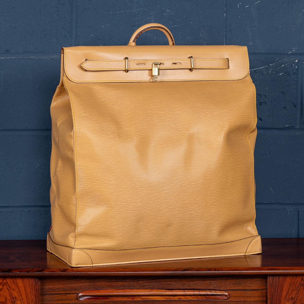 A large Louis Vuitton steamer travel bag in Epi leather, made in France in the latter quarter of the 20th century. Steamer bags have been produced by Louis Vuitton for over 120 years. In 1901, the company introduced the simple canvas and leather