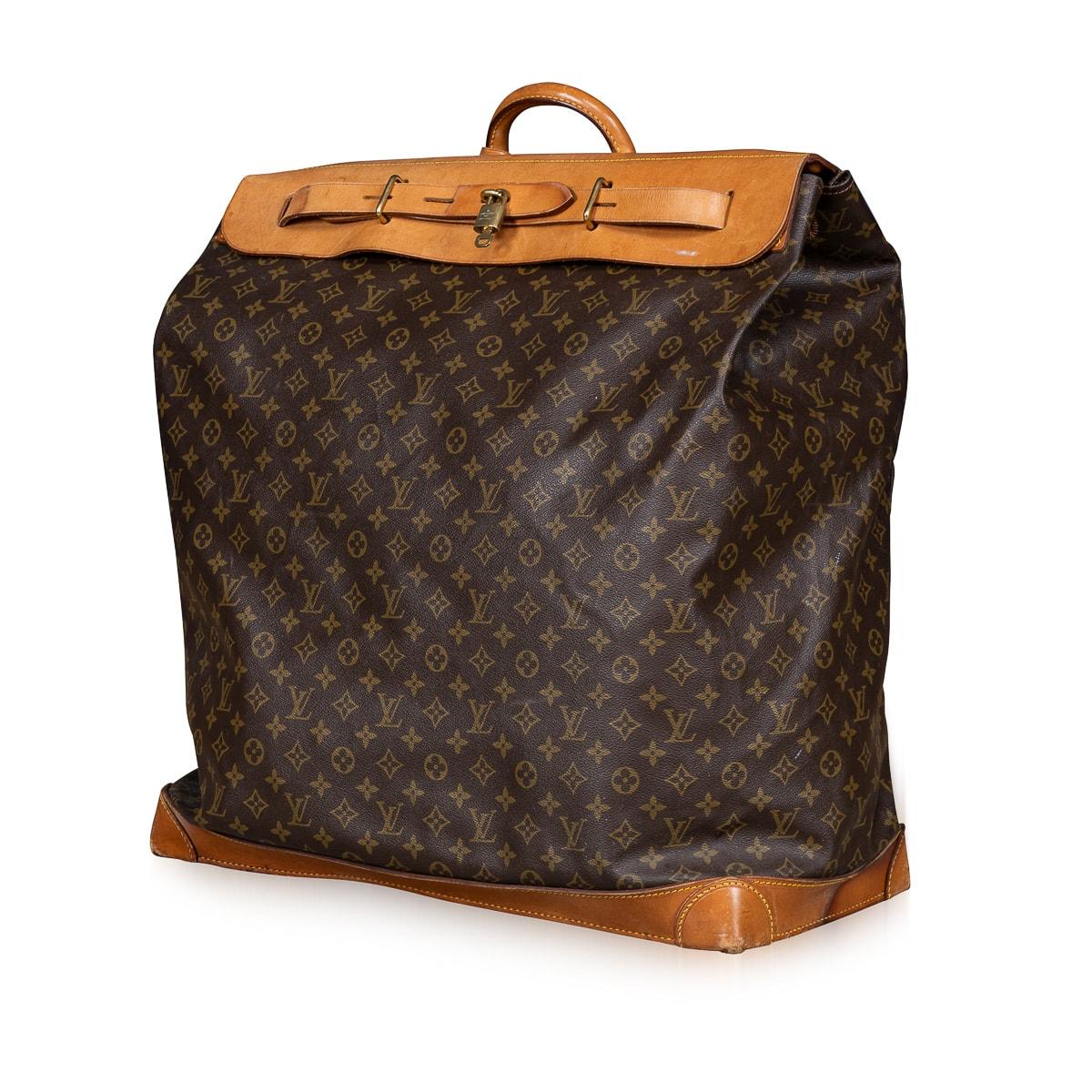 A 20th Century Louis Vuitton steamer travel bag, crafted from monogram canvas and natural tan leather, serves as a quintessential representation of the brand's unwavering commitment to a design seamlessly harmonising style and utility. Inspired by