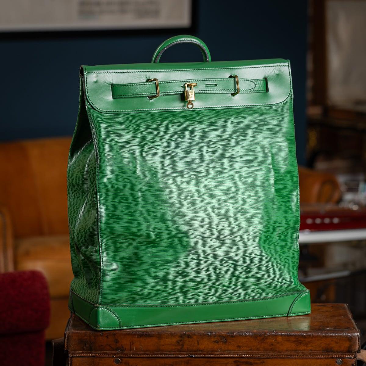 A large Louis Vuitton steamer travel bag in green Epi leather, made in France in the latter quarter of the 20th century. Steamer bags have been produced by Louis Vuitton for over 120 years. In 1901, the company introduced the simple canvas and