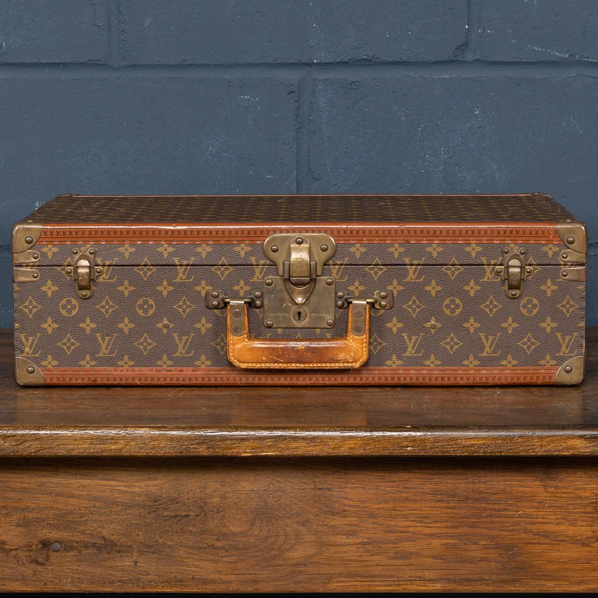 A charming Louis Vuitton hard-sided case, mid to late 20th century, the exterior finished in the famous monogram canvas with brass fittings. A great piece for use today or as a decorative item for the home.

CONDITION
In Good Overall Vintage