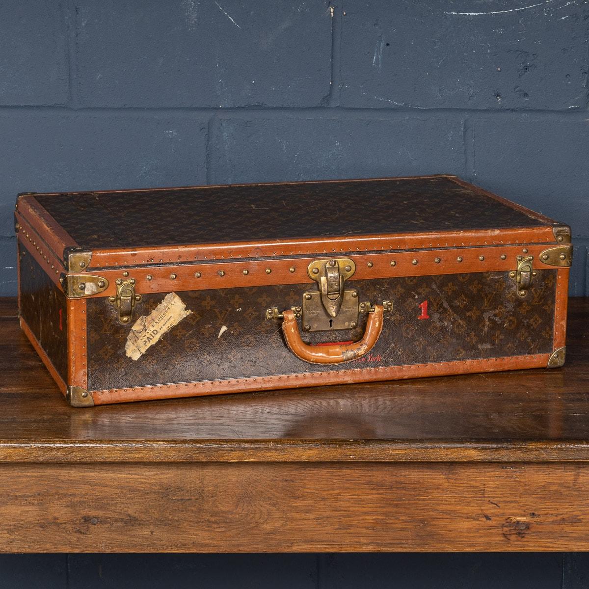 A charming Louis Vuitton hard-sided case, mid 20th century, the exterior finished in the famous monogram canvas with brass fittings. A great piece for use today or as an item for the home.

CONDITION
In overall good vintage condition. Please