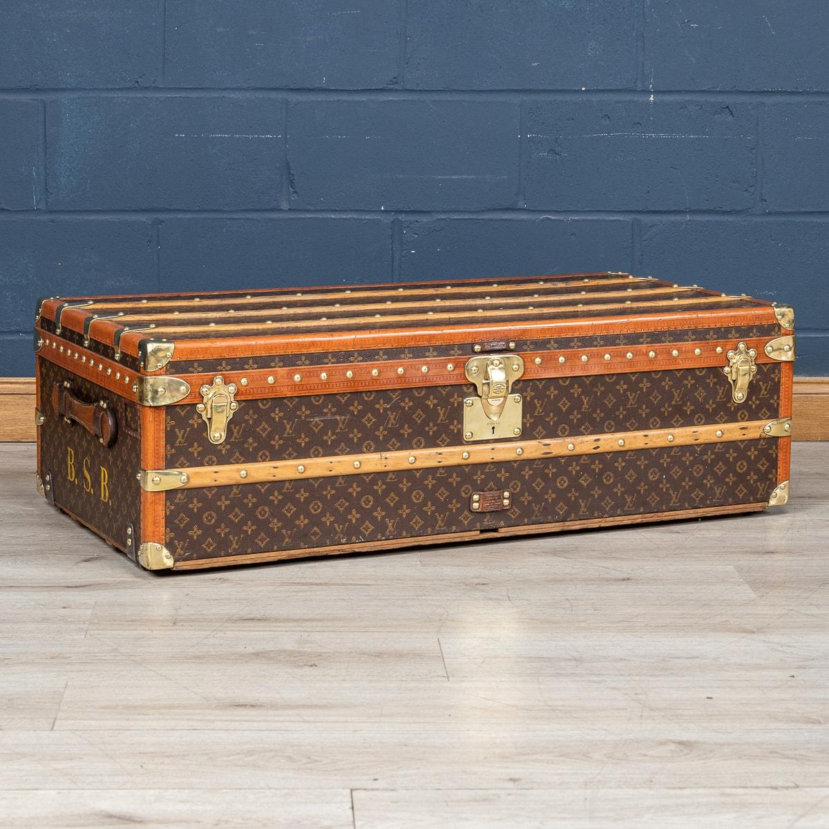 An exquisite and complete Louis Vuitton trunk from the early part of the 20th century. An absolutely essential item for elite travellers of its time the trunk is adorned in the iconic LV monogrammed canvas, accented by lozine trim and brass
