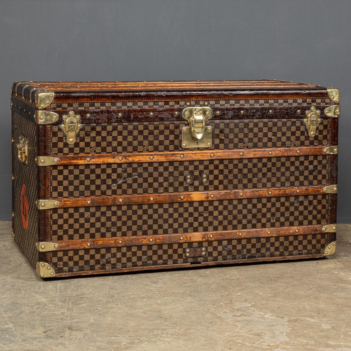 One of the rarest Louis Vuitton trunks to be offered, this trunk is covered in the world famous damier (checkerboard) canvas. Dating to around 1900, it is a perfect example of such trunks. Inside has three original trays and quilted lid. Unusually