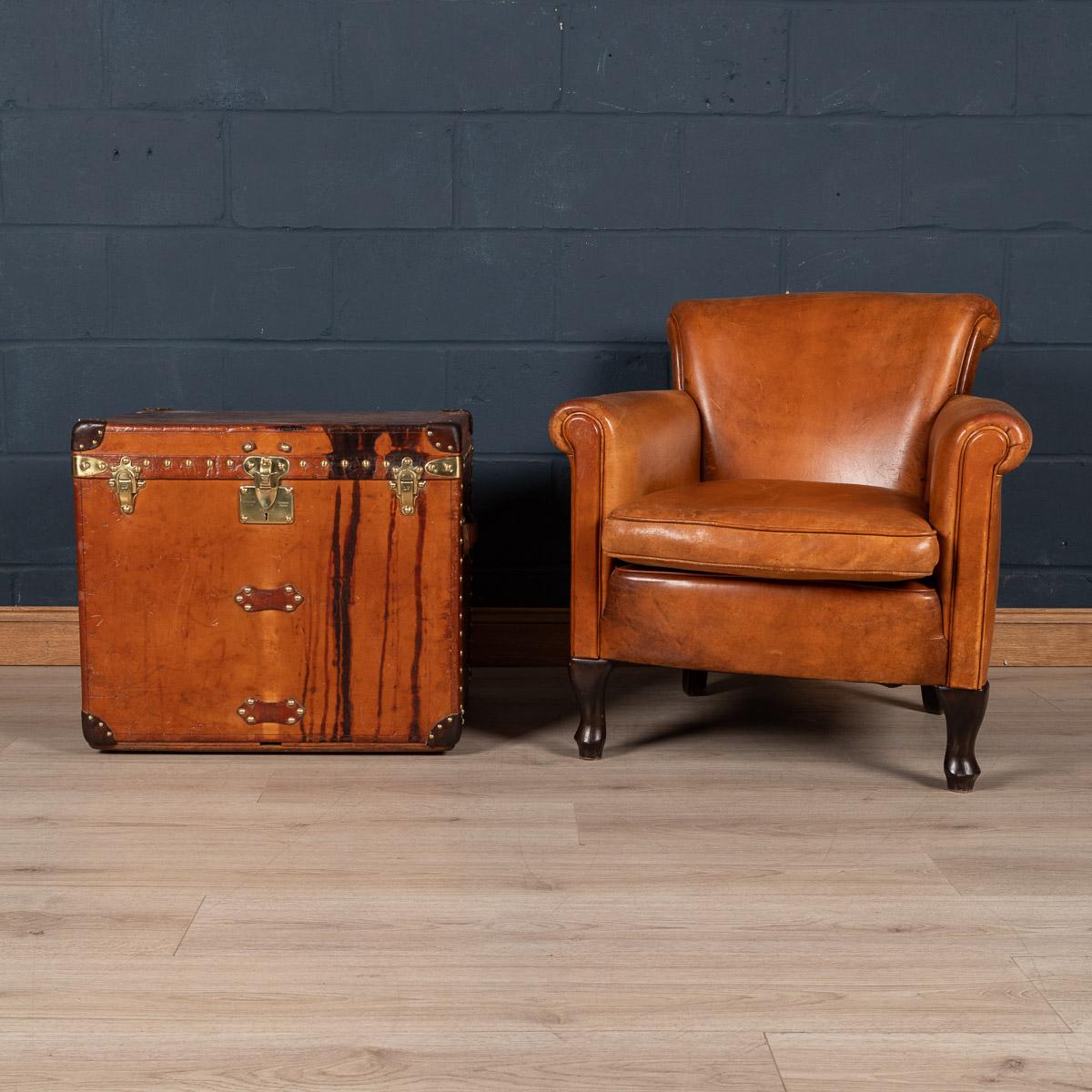 A very rare Louis Vuitton hat trunk dating to the early part of the 20th century, covered not in the world famous (but more common) monogram canvas but in a single piece of cow hide. These all-leather trunks were made by special order and Louis