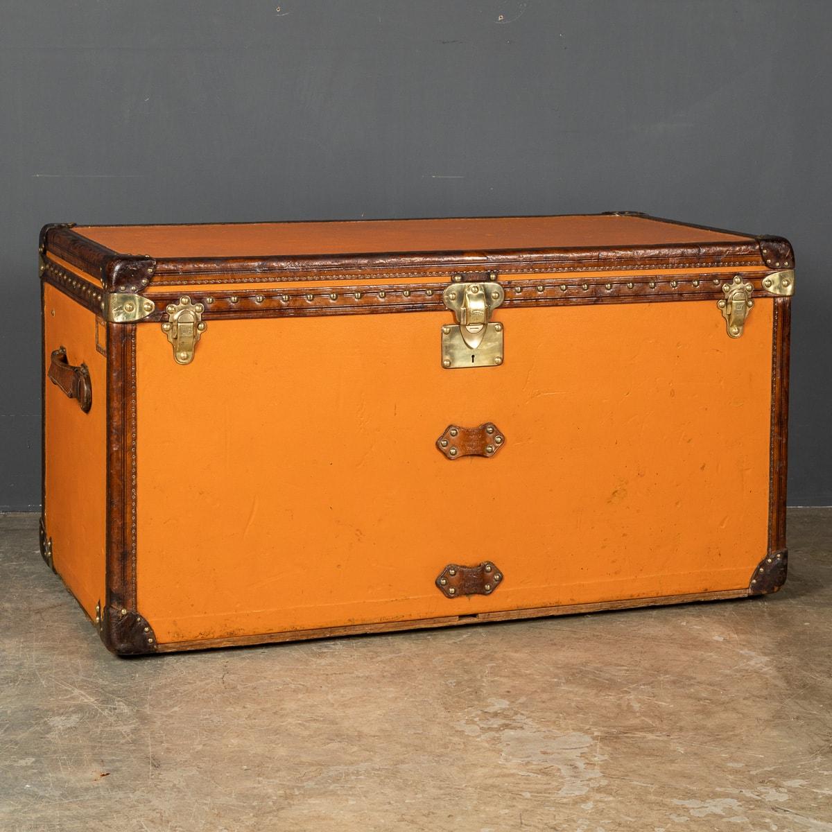 Antique early 20th century very rare Louis Vuitton “high trunk” trunk (from French “Malle Haute”), circa 1900's, features orange “Vuittonite“ canvas, all brass hardware, and leather trims. It is rare to find these trunks in as good condition as this
