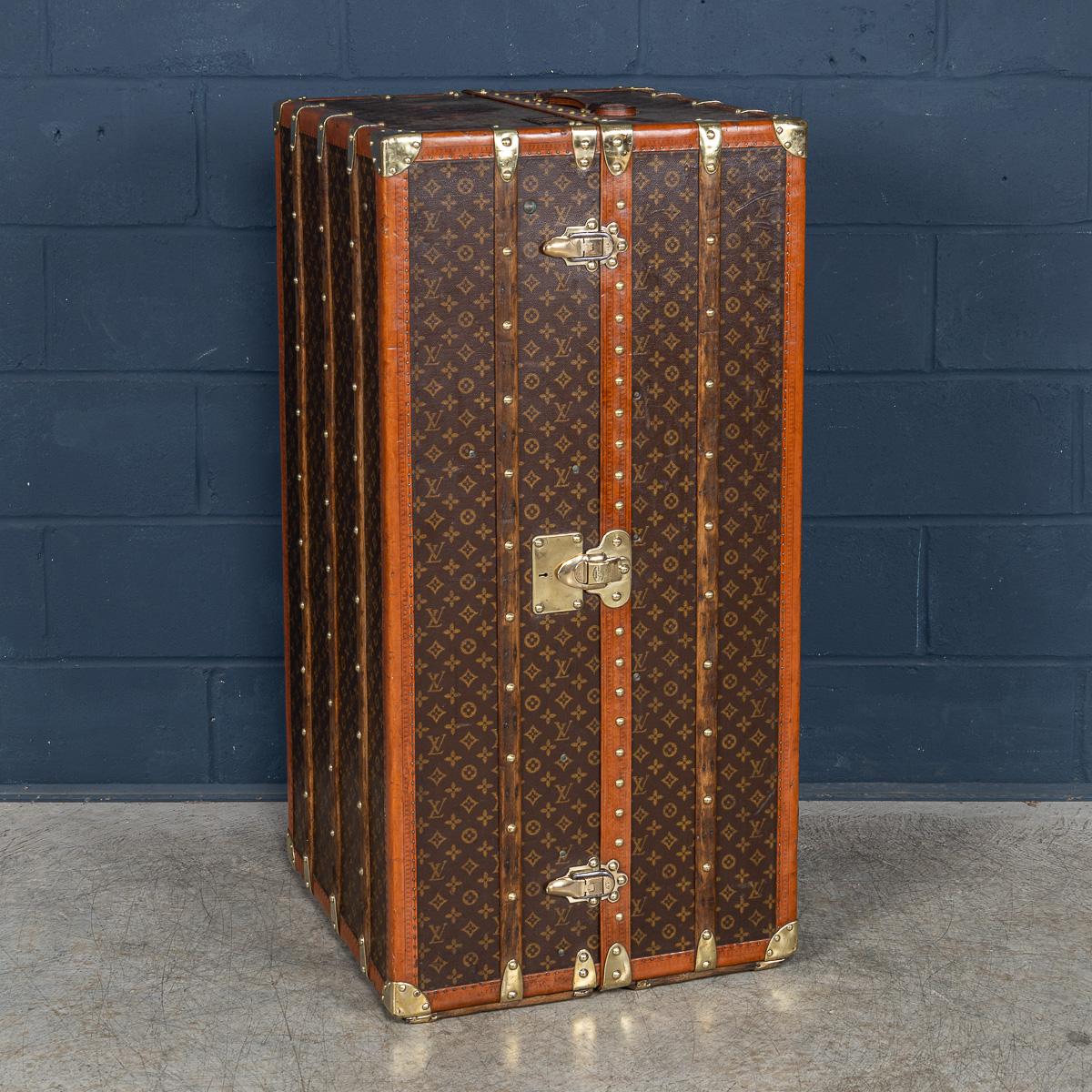A stunning early 20th century Louis Vuitton wardrobe trunk covered in the world famous LV monogrammed canvas. With its lozine borders and brass fittings it would have been the top of the line even at the time of purchase some 100 years ago.

Oozing