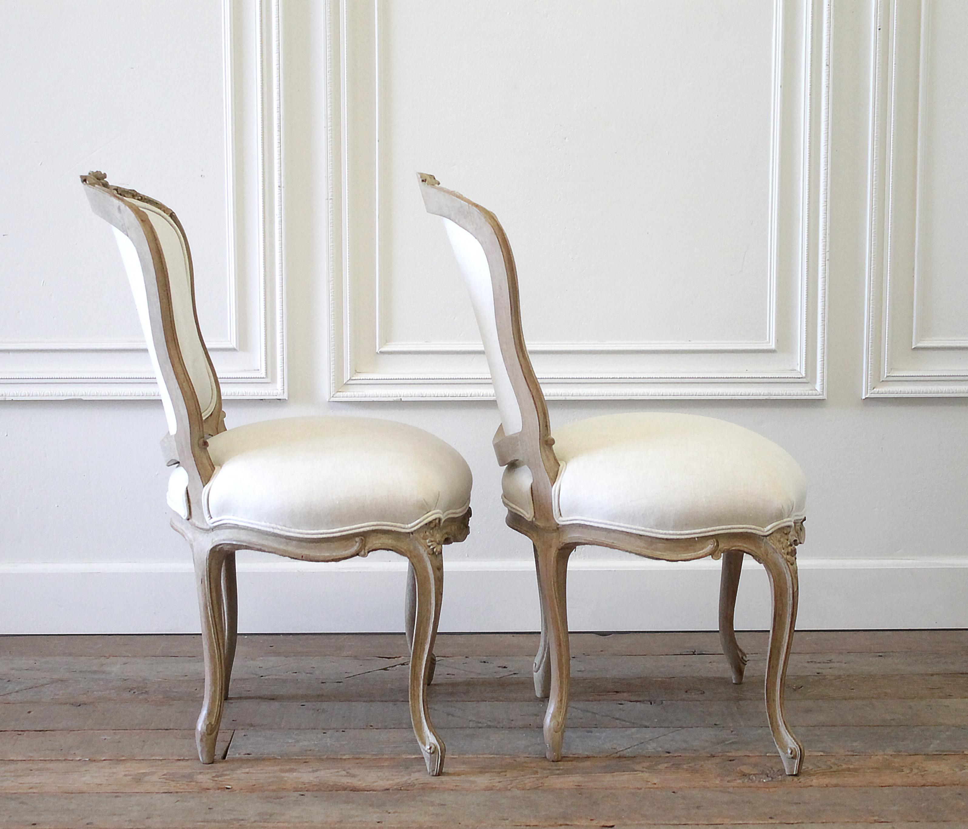 20th century Louis XV style carved wood and linen upholstered chairs
We have only these two available and they are sold individually. Original wood finish, with antique grey tones. Upholstered in 100% pure Belgian linen, in a light oatmeal