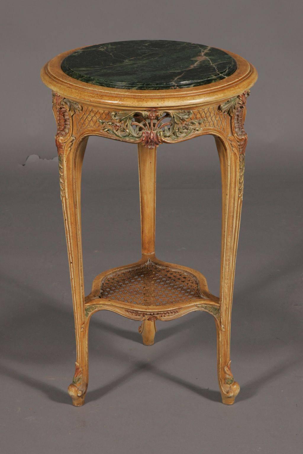 Excellent French occasional table in Louis XV style.
Highly valuable solid beechwood carved to the finest detail. Colored inlays and gilded.

(G-Sam-25).