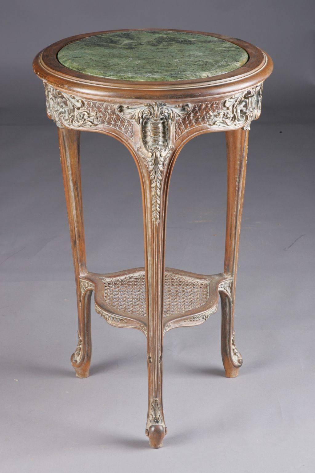 Excellent French occasional table in Louis XV style.
Highly valuable, solid beech wood carved to the finest detail, colored inlays and gilded.

(G-Sam-26).
  