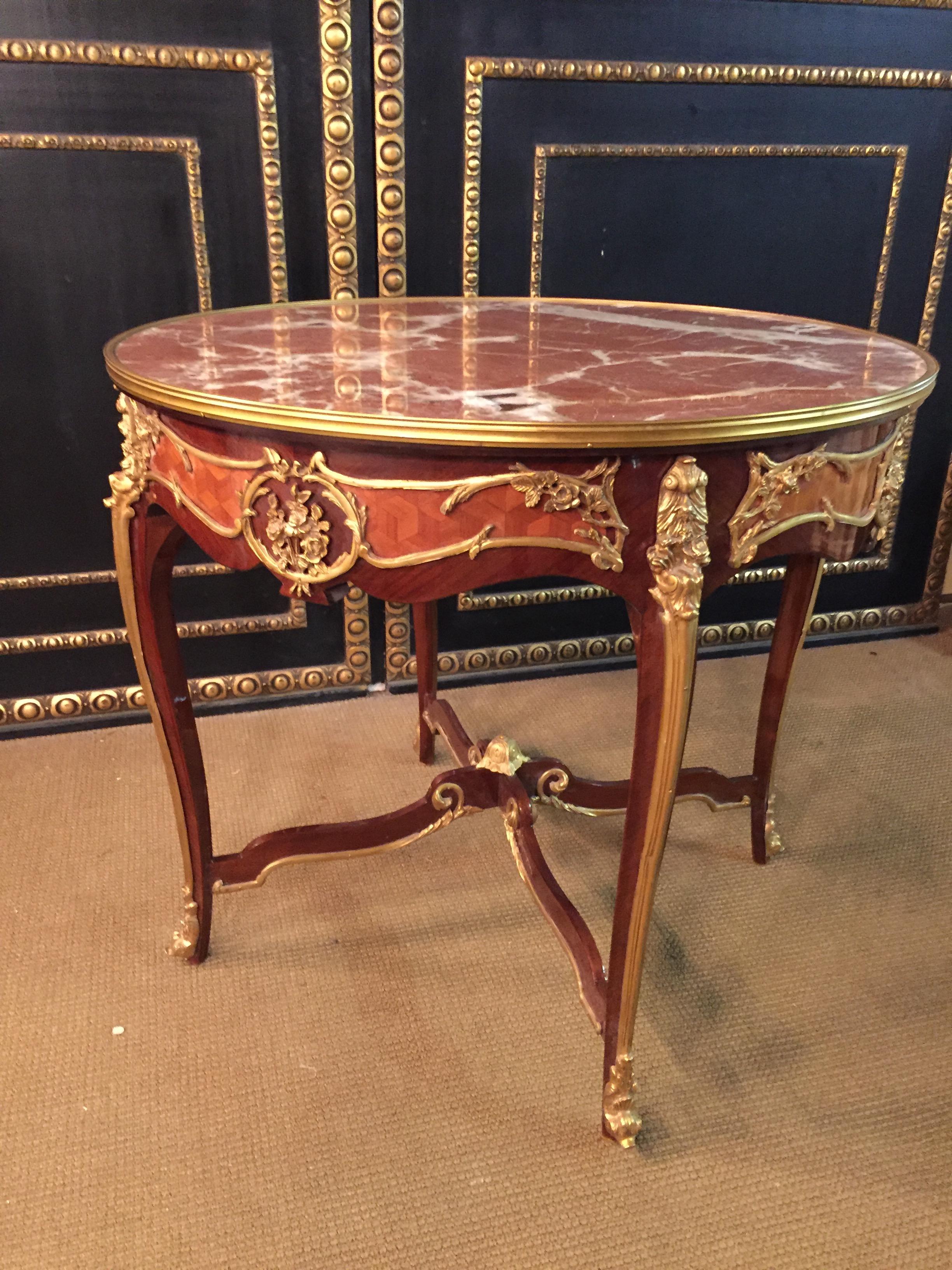 Rose veneer on solid pine wood. Exceptionally finest engraved, decorative broken seed beads inlaid with acanthus and blooming details. Round, single row brass border inlaid with a marble top. These proportions are accurate and require a high