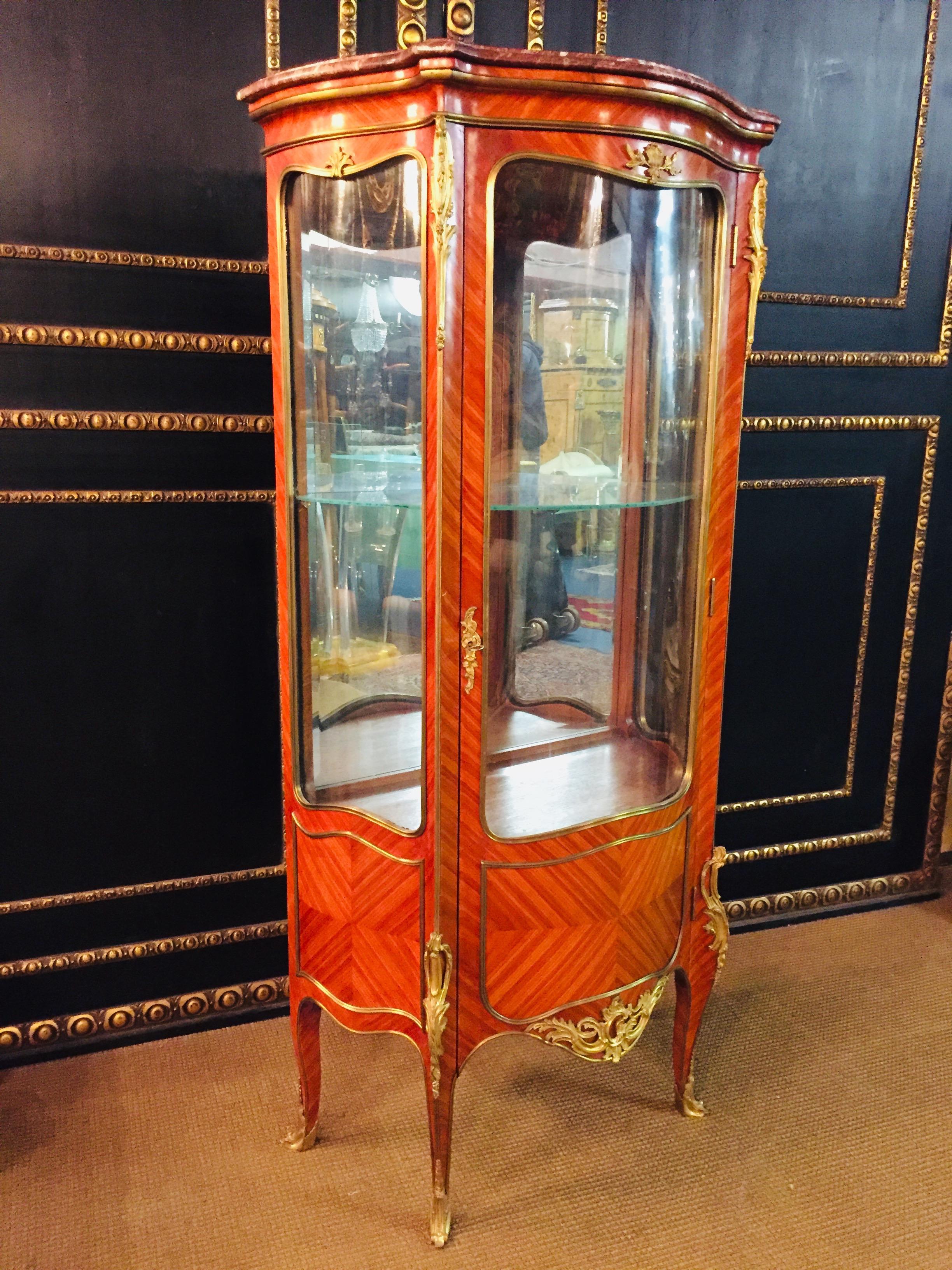 Only this Week Special Price 

Petite French cabinet in the style of Louis XV Rococo. Bois-Satiné veneer, all-round surface-covering mirror veneer on solid conifers. High-rise, one-armed, cambered body, three-sided to three-section, on high