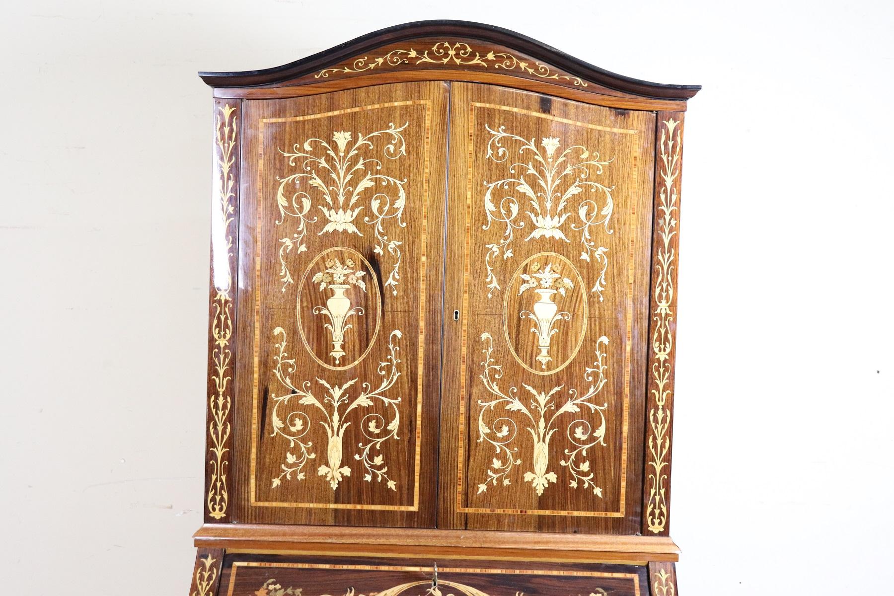 Important elegant chest with secretaire Rosewood inlaid with wood essences of various types, full Louis XV Style period, 1950s. The Rosewood inlay work is extremely meticulous. Work possible only by major cabinet makers. We recommend looking at the