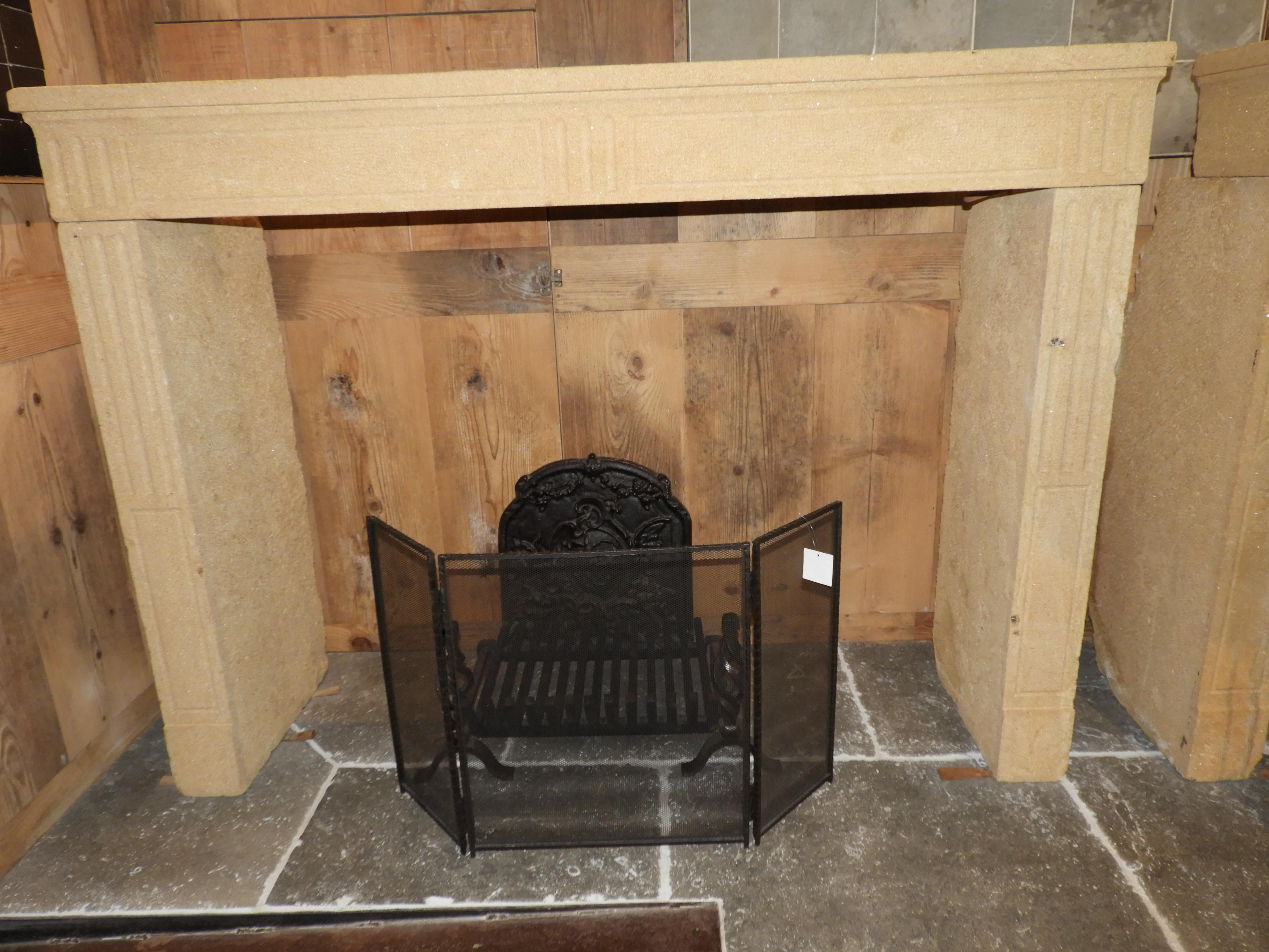 20th century French limestone Louis 16 fireplace.
Measures: Inside 153 cm wide x 113.5 cm high.