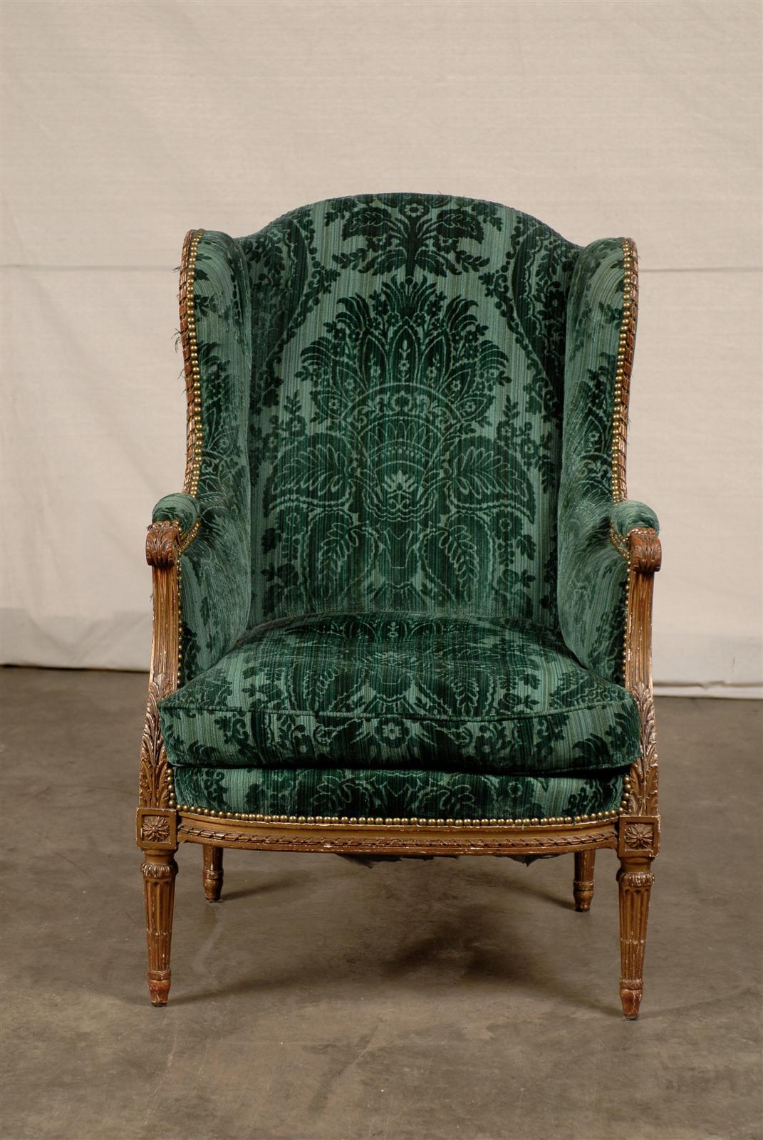 20th century Louis XVI giltwood wingback chair
Measures: 28