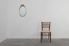 20th century Louis XVI style mirror in gilded wood, France