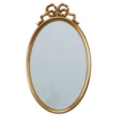 20th century Louis XVI style mirror in gilded wood, France