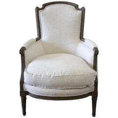 20th Century Louis XVI Style Painted French Bergère Chair in Natural Linen