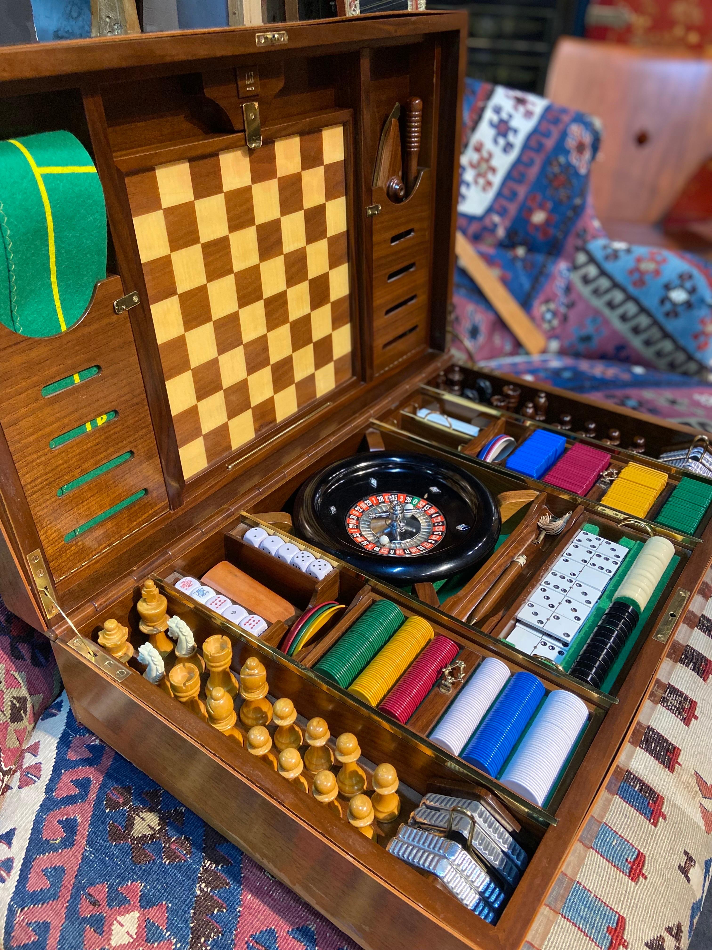 20th Century luxurious French game set by Alfred Dunhill.
The set contains different type of gambling games which are perfectly arranged in a luxury mahogany box. There are no missing pieces and the entire set is in very good condition. 
France,