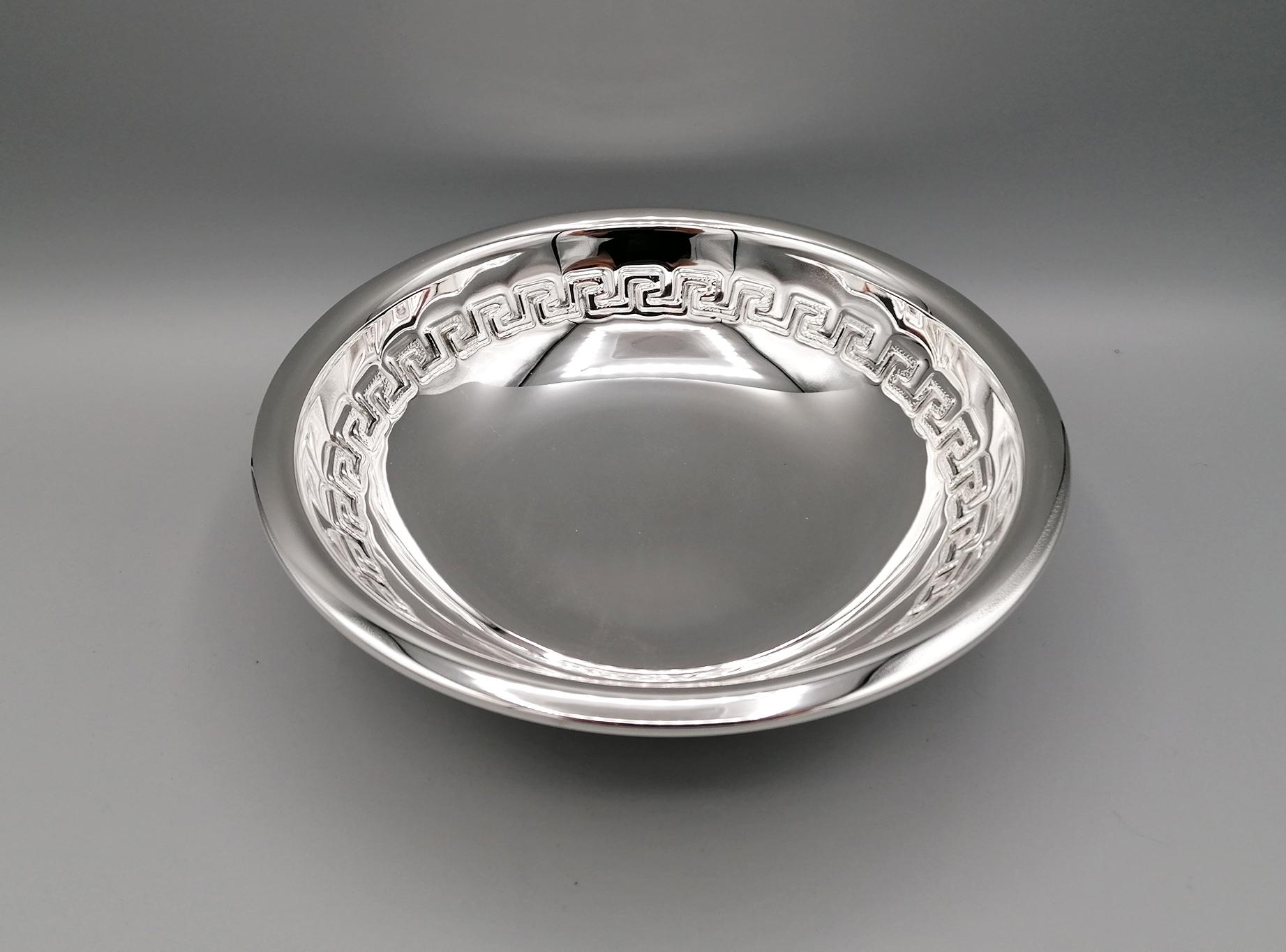 Double chamber solid 800 silver bowl. The internal workmanship is chiseled in neoclassical style, while the external part is completely smooth. A smooth round base has been welded under the bowl to streamline its shape.
Italian silverware, already