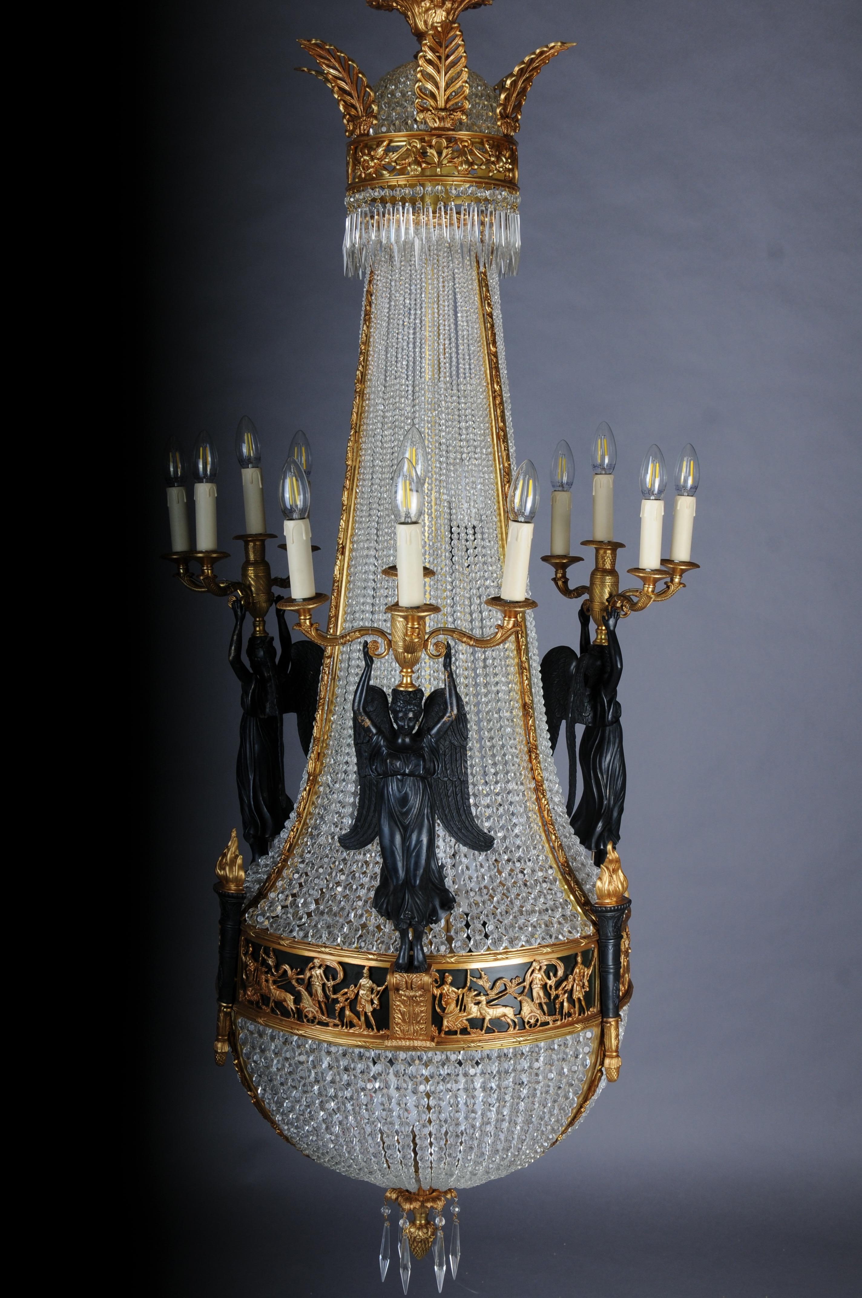 20th Century Magnificent Empire Victoria Chandelier after Pierre Philippe Thomire

Exceptionally beautiful, engraved and cast bronze. Basket-shaped body made of hand-cut French spherical prisms (over 3,600 pieces). Connected by a broad, ornamentally