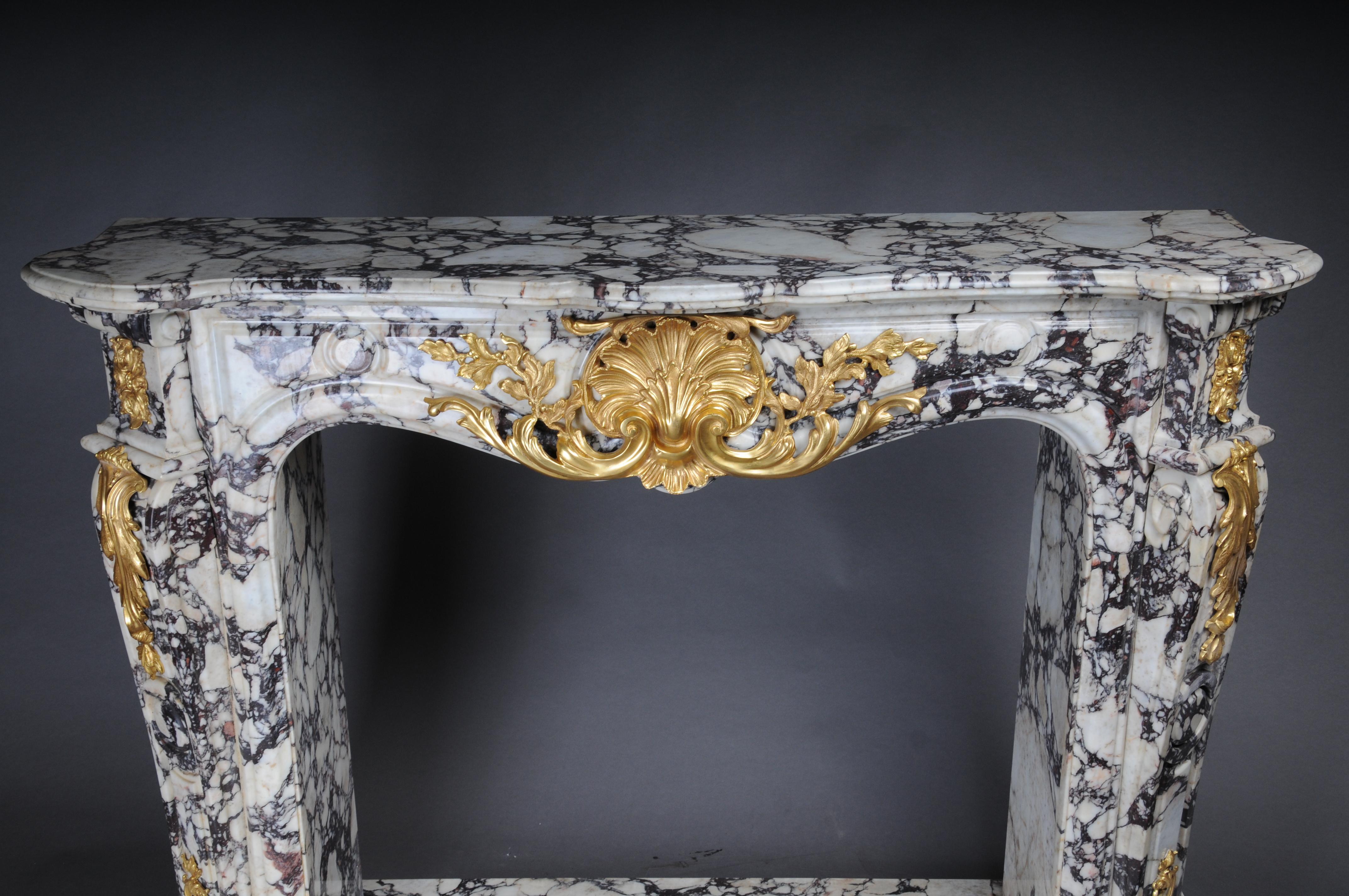 Gilt 20th Century Magnificent French marble fireplace with gilded bronze. For Sale