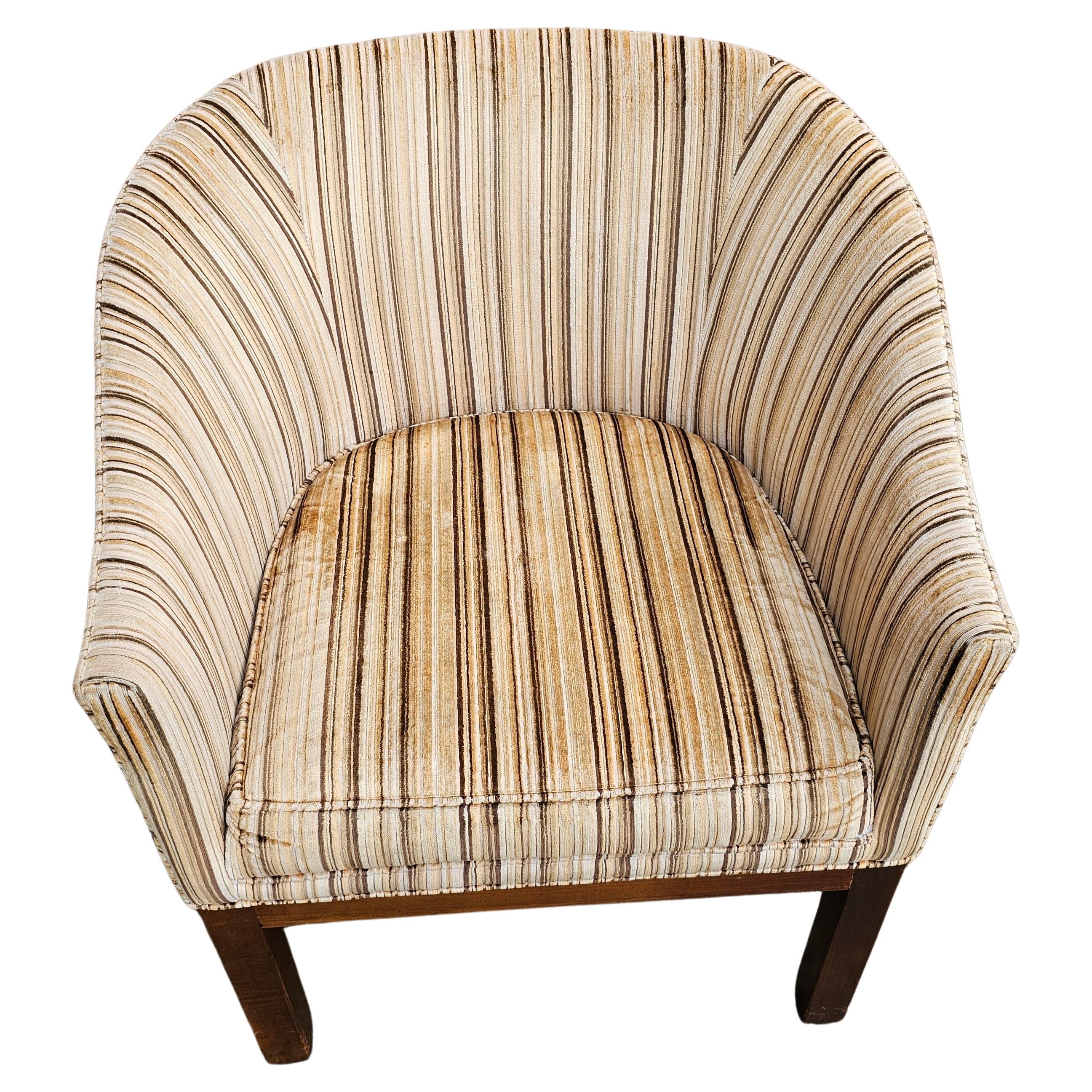A late 20th Century Mahogany and Stripped Velvet Upholstered Barrel Back Club Chair. Measures 24.5