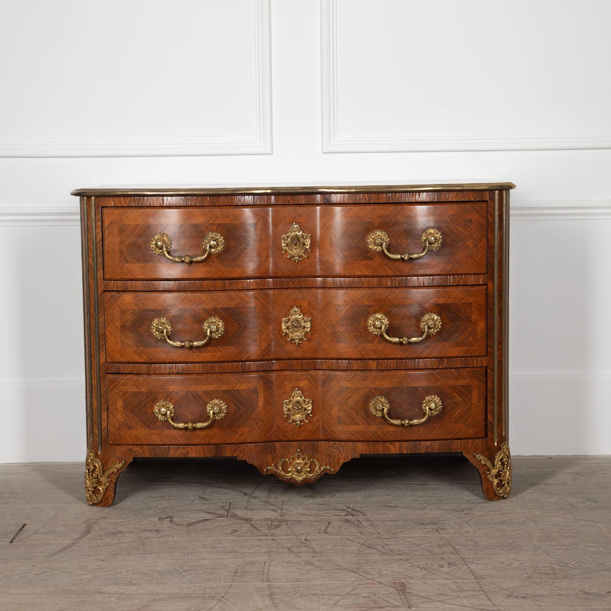 Mid 20th Century French Maison Jansen commode.

In the regency style with bronze mounts and kingwood veneer.

(Book on this item: Jansen Furniture By James Archer Abbott - page 248)