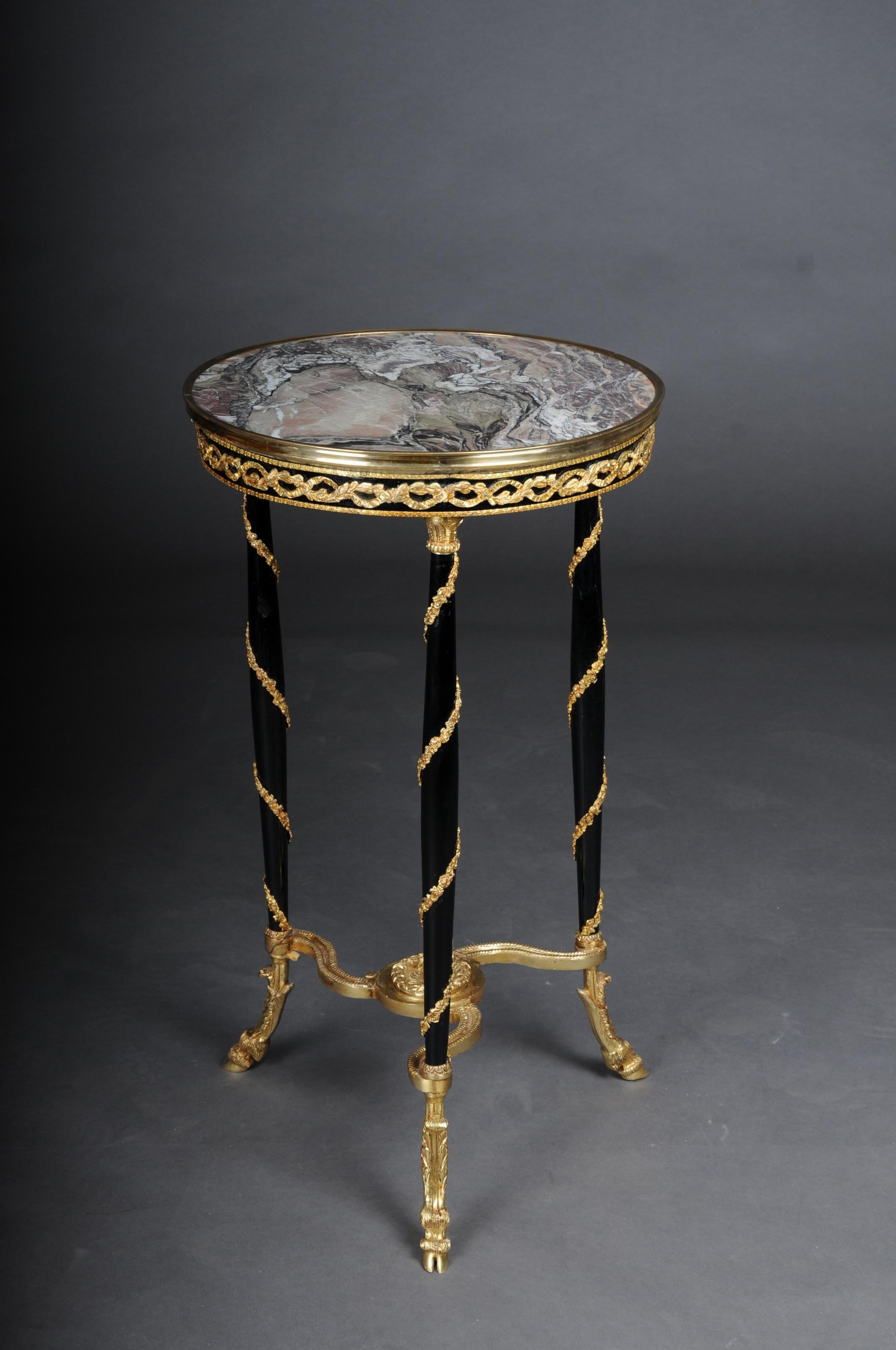 20th century Majestic Empire side table/gueridon beechwood, marble, round, black

Model after Adam Weisweiler 1780

Solid beech wood painted black with gilded brass bronze. Top plate with brass-framed marble top.
Elegant full column legs
