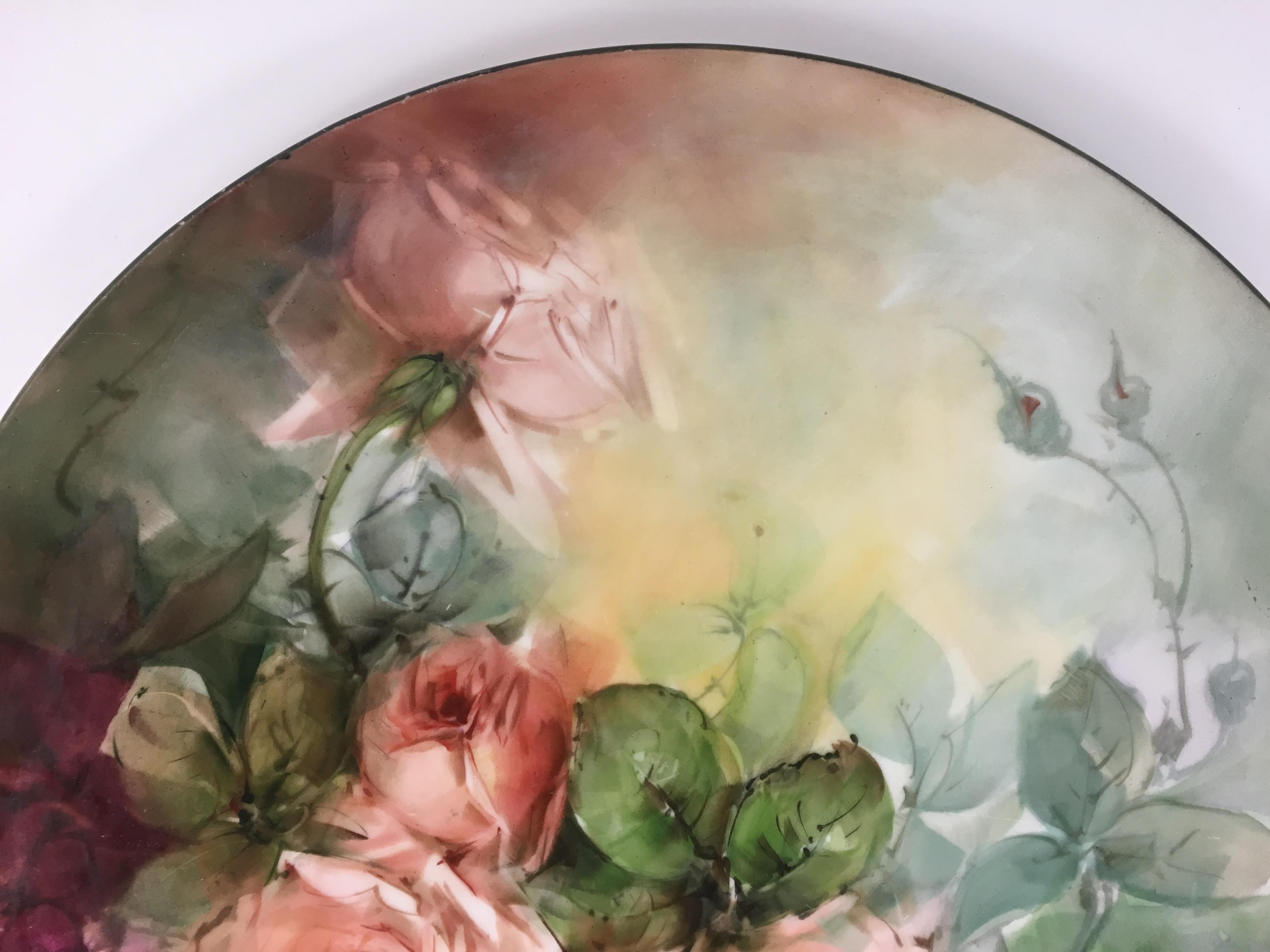 A fine and very decorative 20th century French Barbotine style majolica floral art charger or plate.

Painted in a neutral palette of white, green, pale pinks and yellow, this French barbotine style majolica floral platter or plate would make a