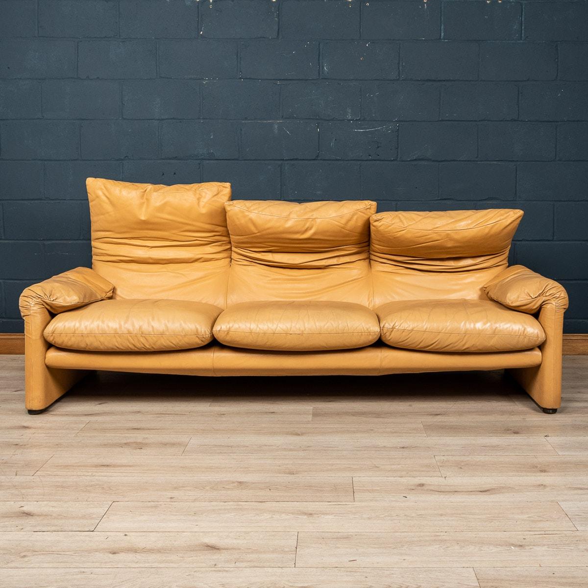 A large 3-seater “675 Maralunga” sofa in original beige leather upholstery. The Maralunga sofa was designed by Vico Magistretti in the early 1970s for Cassina. Cosy and adaptable, the ever cool sofa was an instant classic. Comfort comes in 2 forms