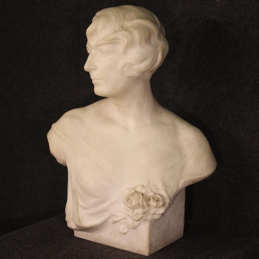 Great Belgian sculpture from the 1920s/30s. Statuary marble work of great size and impact, depicting a bust of a woman with a flower of excellent quality. Sculpture finished from the center with references to the Art Nouveau style, signed Paul