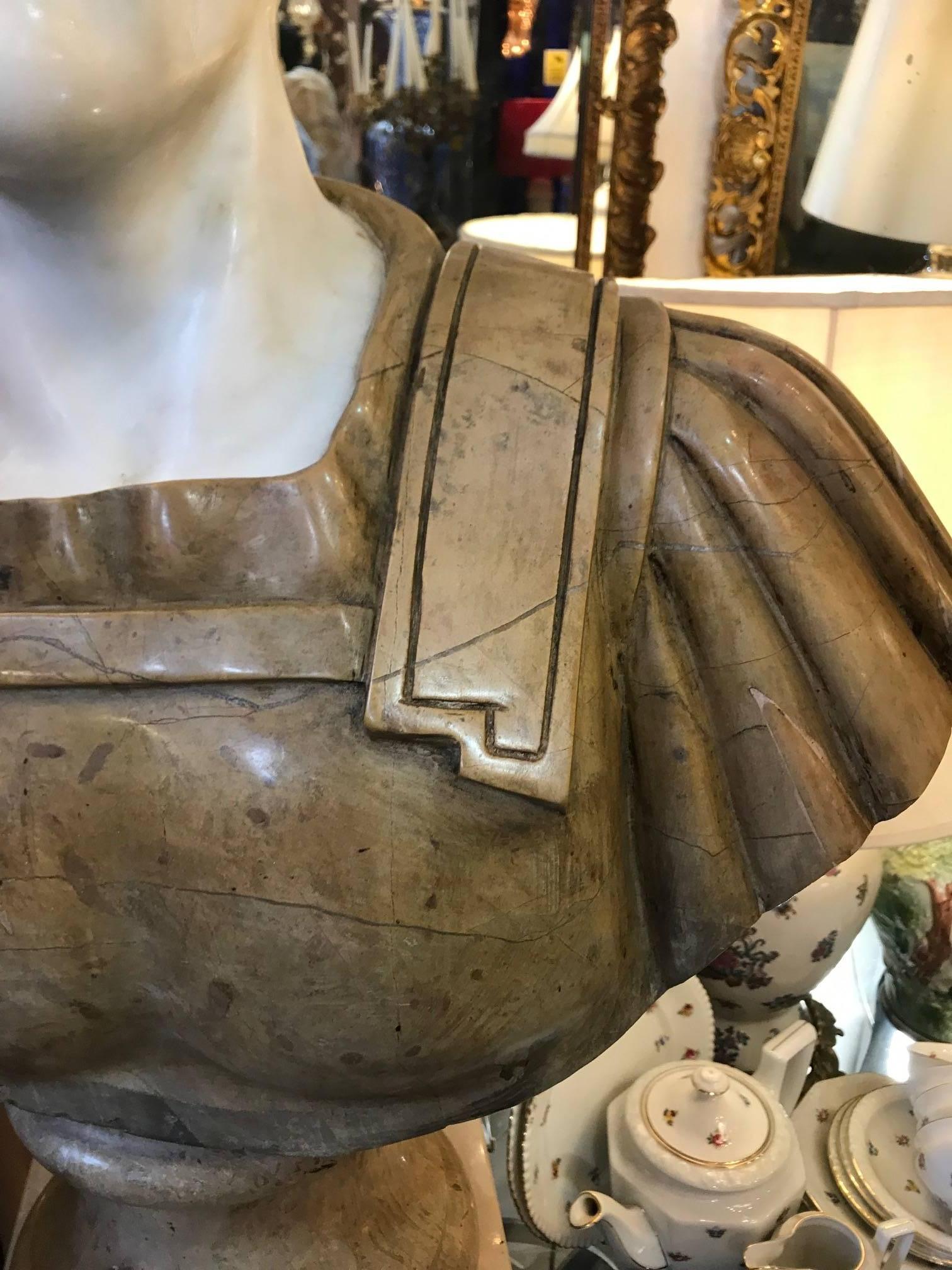 20th century marble Roman bust of a Roman military dignitary or Emperor. Made with white and Siena marble.